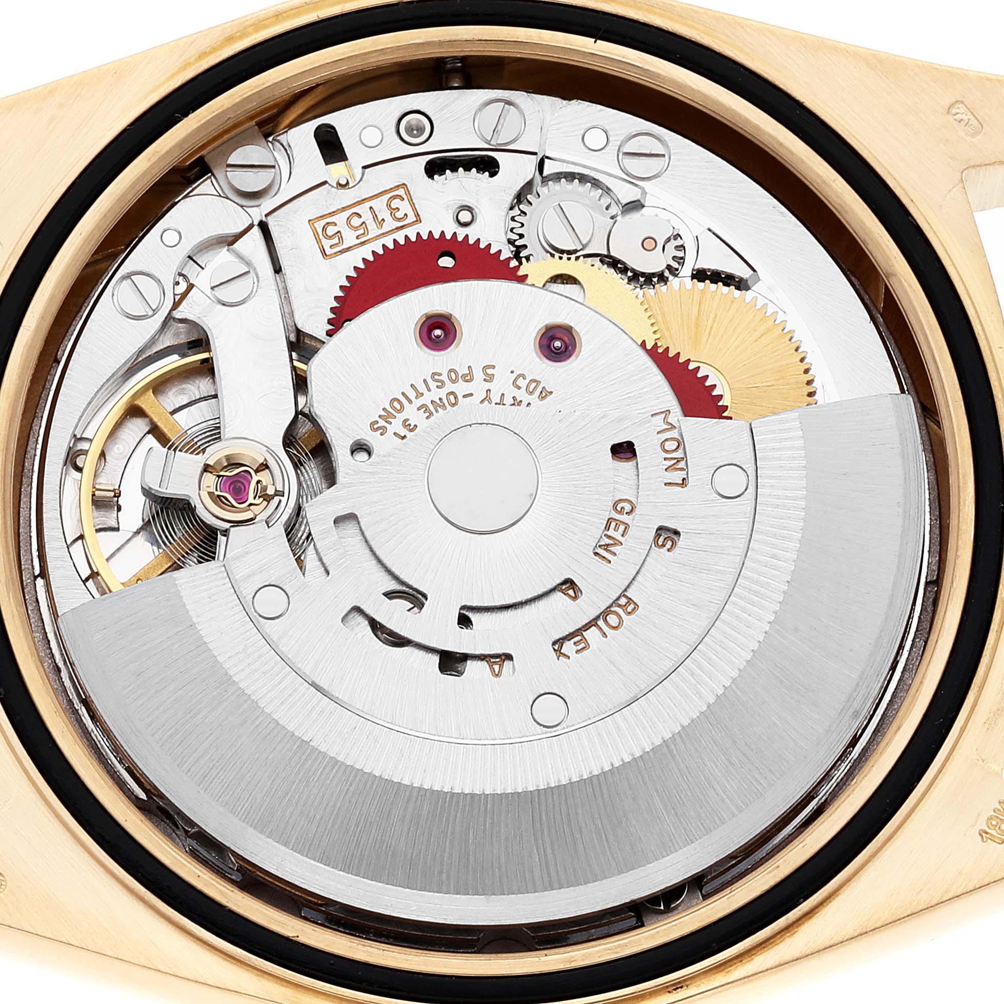 This image shows a close-up view of the intricate movement inside a Rolex President 18248 Men's Yellow Gold Champagne Dial 18248 Men's Yellow Gold Champagne Dial model watch.