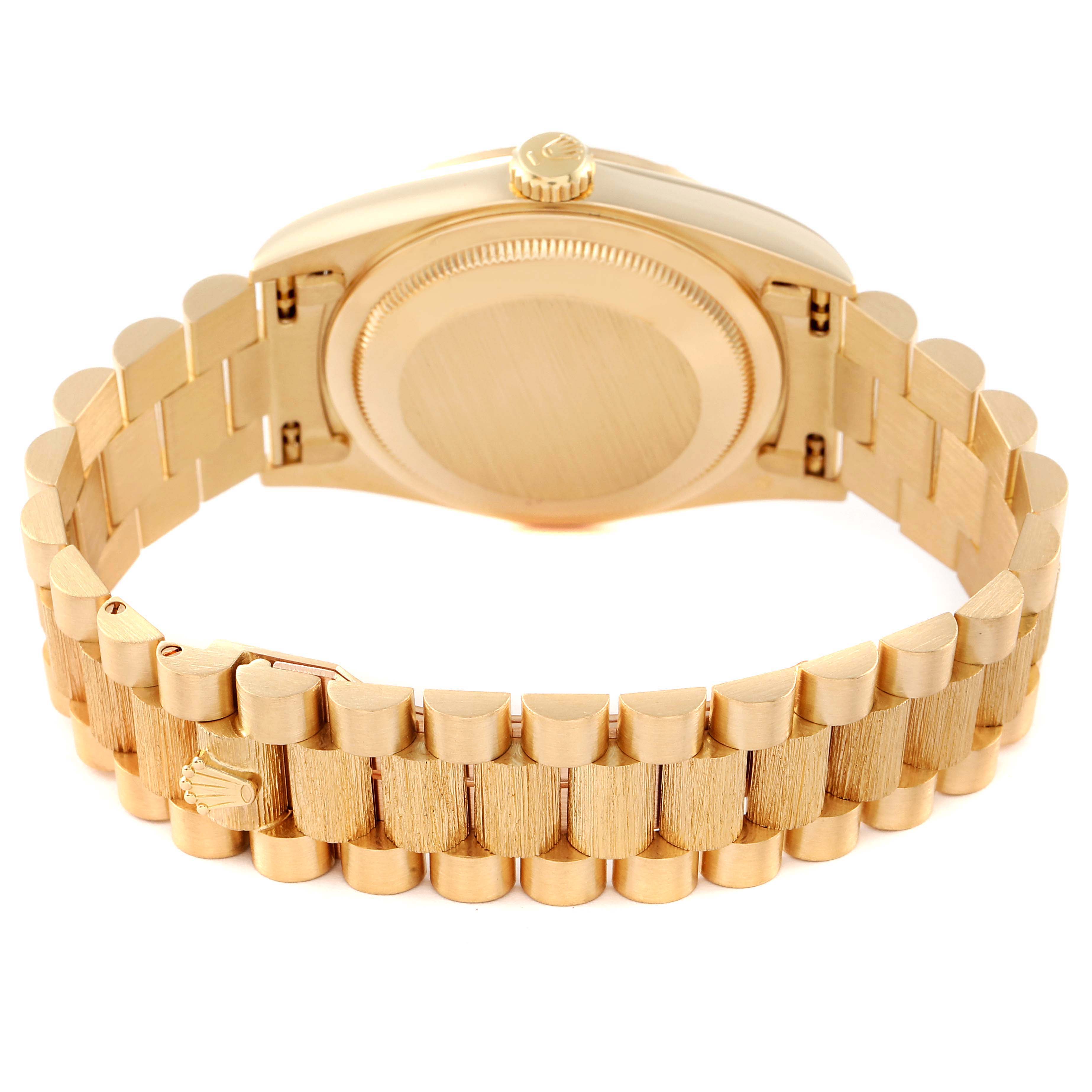 This image shows the back view and bracelet of a Rolex President 18248 Men's Yellow Gold Champagne Dial 18248 Men's Yellow Gold Champagne Dial model watch, highlighting its gold case and bracelet links.