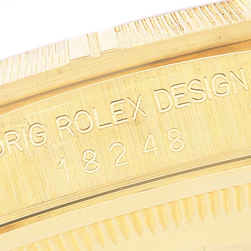The image shows a close-up of the outer rim and bezel of a Rolex President 18248 Men's Yellow Gold Champagne Dial 18248 Men's Yellow Gold Champagne Dial model watch, displaying the engraved model number.
