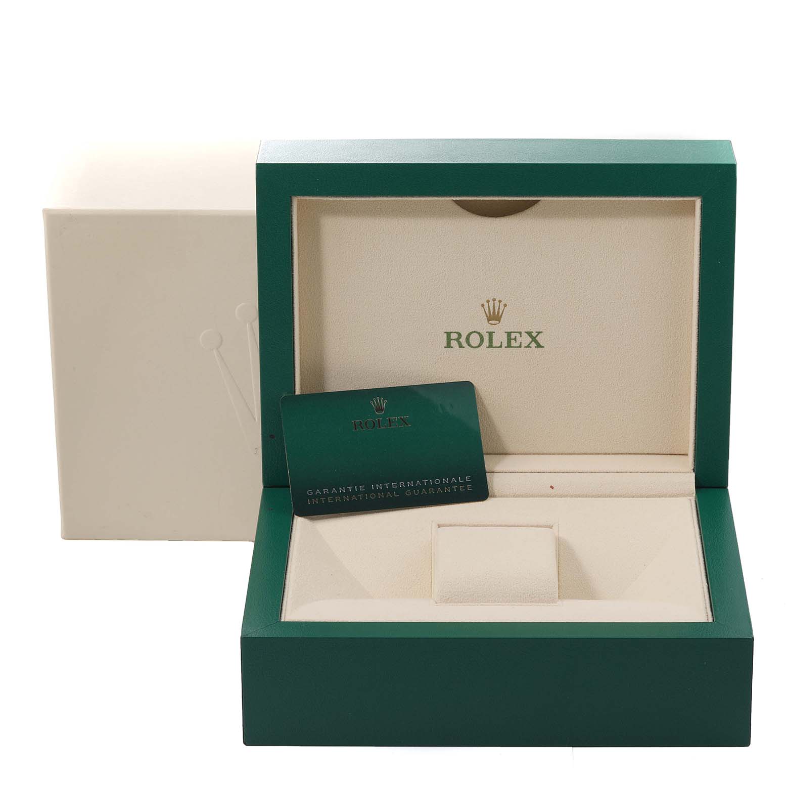This image shows an open Rolex Daytona 116508 Men's Yellow Gold Green Dial 116508 Men's Yellow Gold Green Dial watch box and an international guarantee card from a front angle.