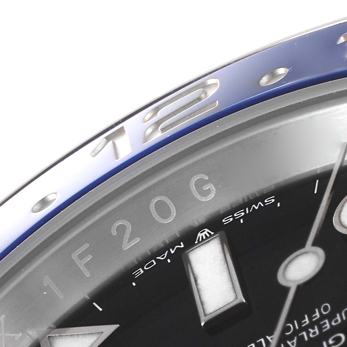 This image shows a close-up of the bezel and part of the dial of a Rolex GMT-Master 126710 Men
s Stainless Steel Black Dial 126710 Men
s Stainless Steel Black Dial watch.