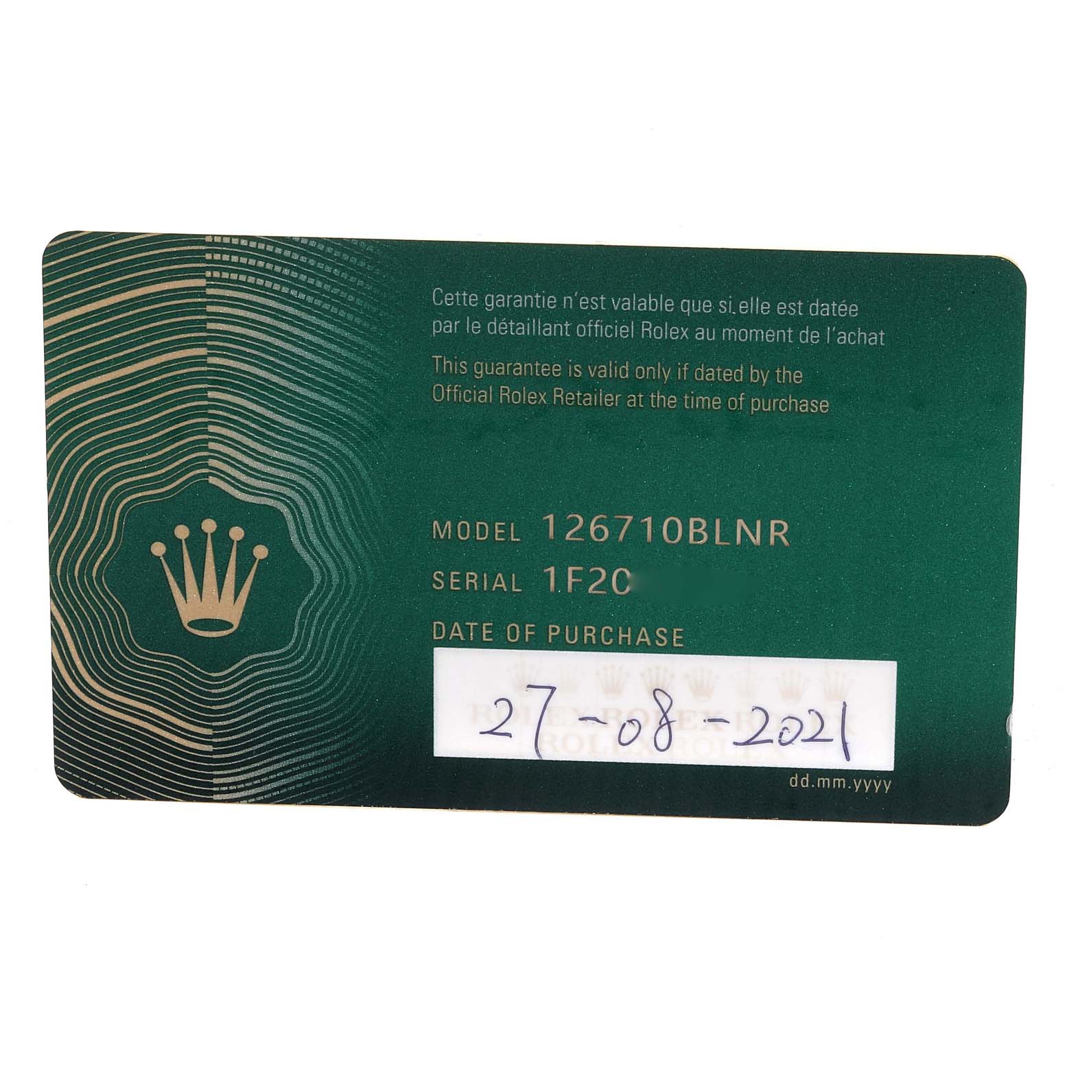 A close-up of the warranty card for the Rolex GMT-Master 126710 Men
s Stainless Steel Black Dial 126710 Men
s Stainless Steel Black Dial model 126710BLNR, showing the model, serial number, and purchase date.