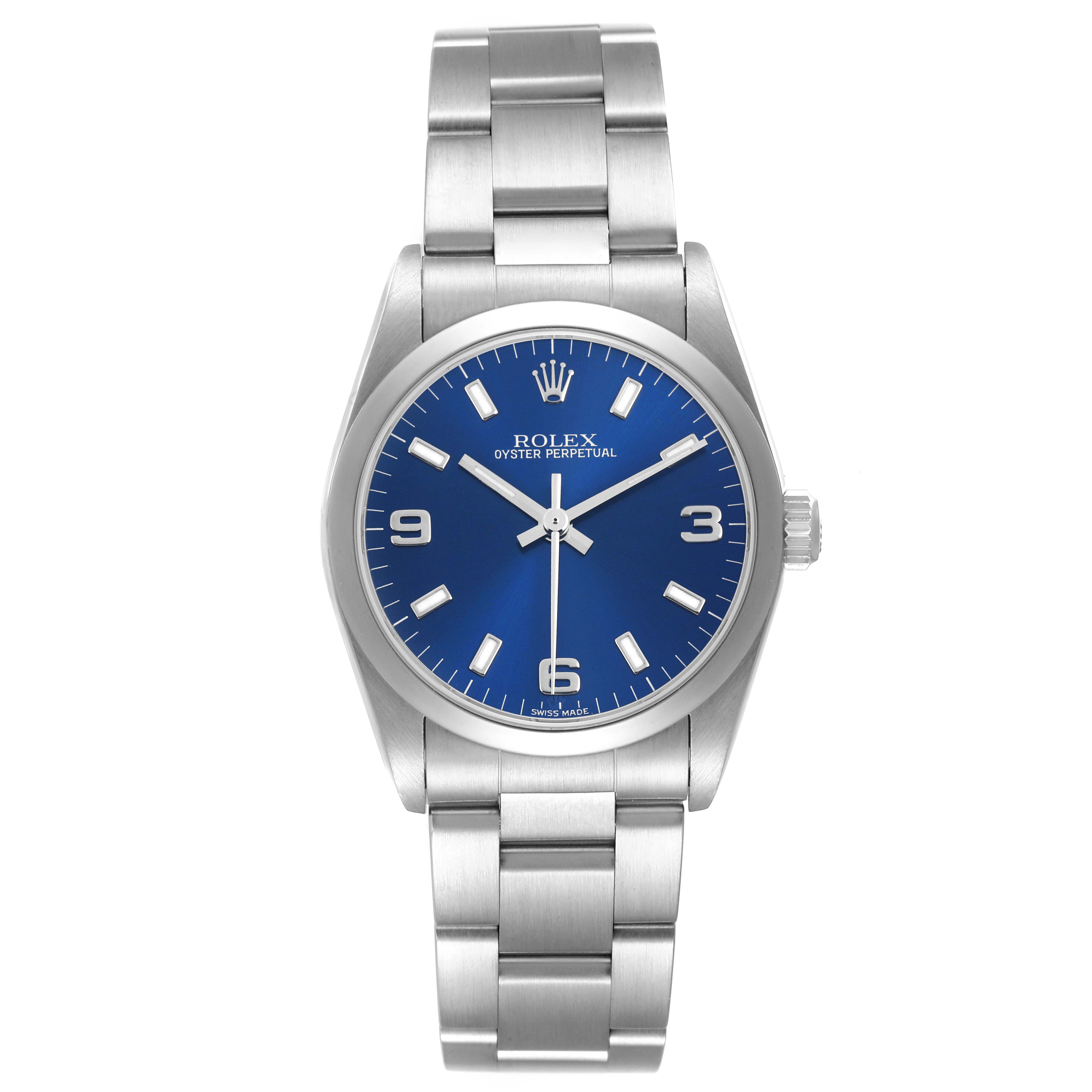 The Rolex Oyster Perpetual 77080 Women's Stainless Steel Blue Dial watch is shown from a front angle, displaying the blue dial, stainless steel bracelet, and crown.