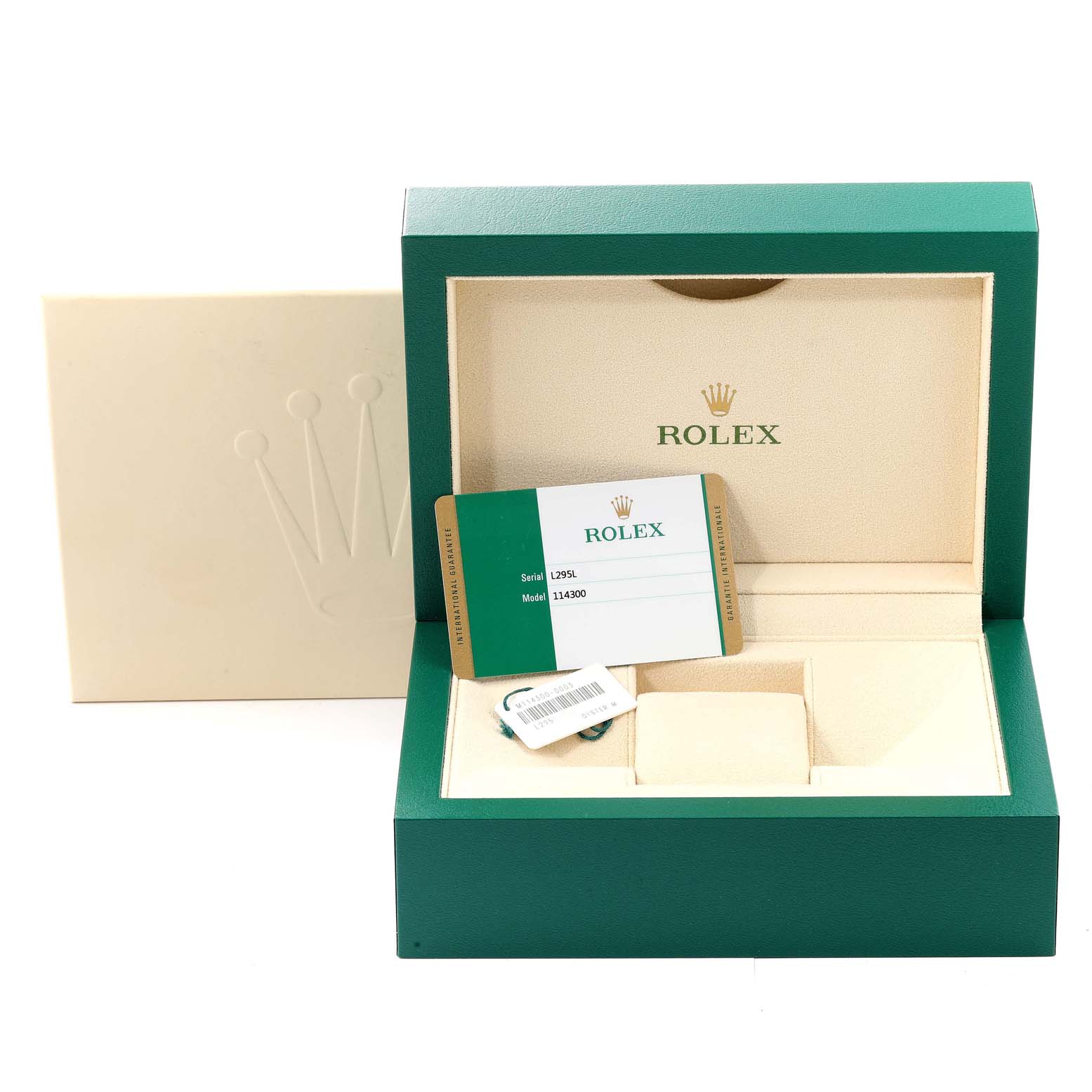 The image shows an open green Rolex box for the Oyster Perpetual model with its warranty card and accessories inside.