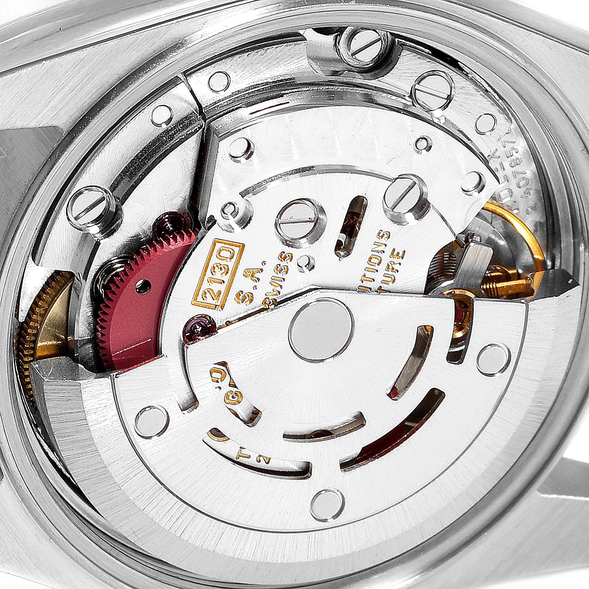 This is a close-up view of the movement mechanism inside the Rolex Oyster Perpetual 67183 Women's Steel and Gold (two tone) Grey Dial 67183 Women's Steel and Gold (two tone) Grey Dial watch.