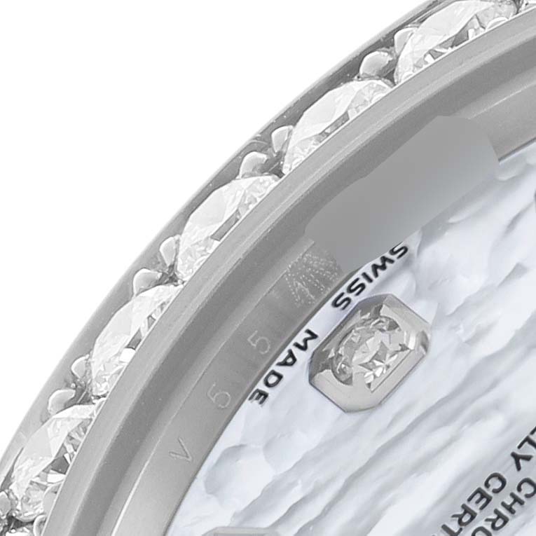 The image shows a close-up angle of the Rolex Pearlmaster 81299 Women's White Gold Mother of Pearl Dial's diamond-set bezel and partial dial inscription.