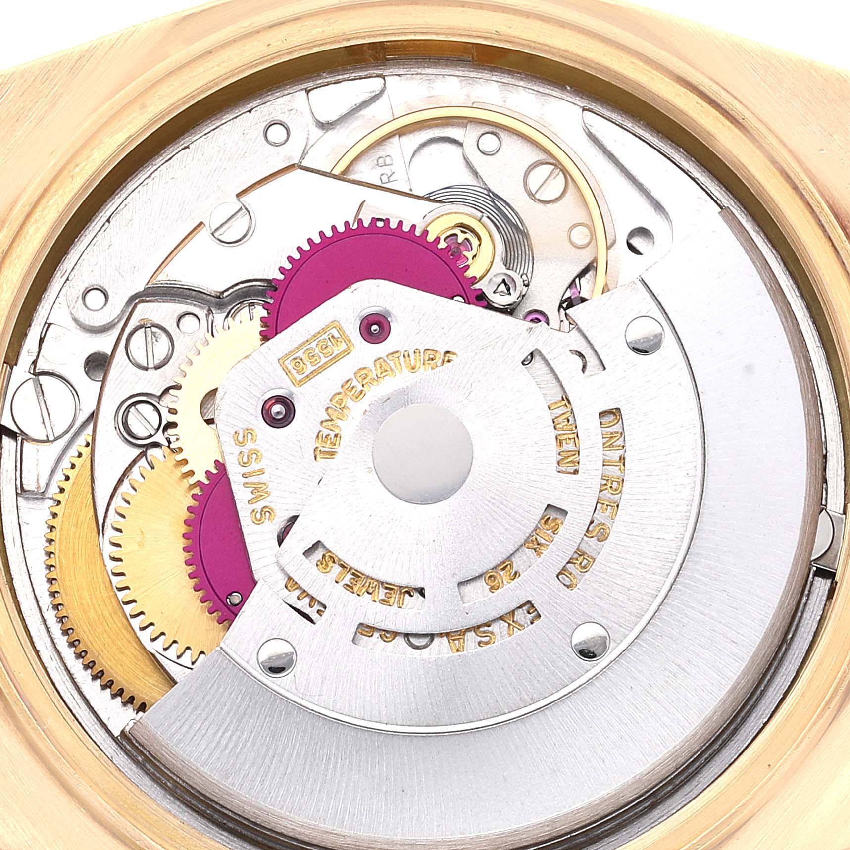 This image shows the intricate internal mechanics of the Rolex Vintage Collection 1803 Men's Yellow Gold Champagne Dial 1803 Men's Yellow Gold Champagne Dial model, viewed from the back.