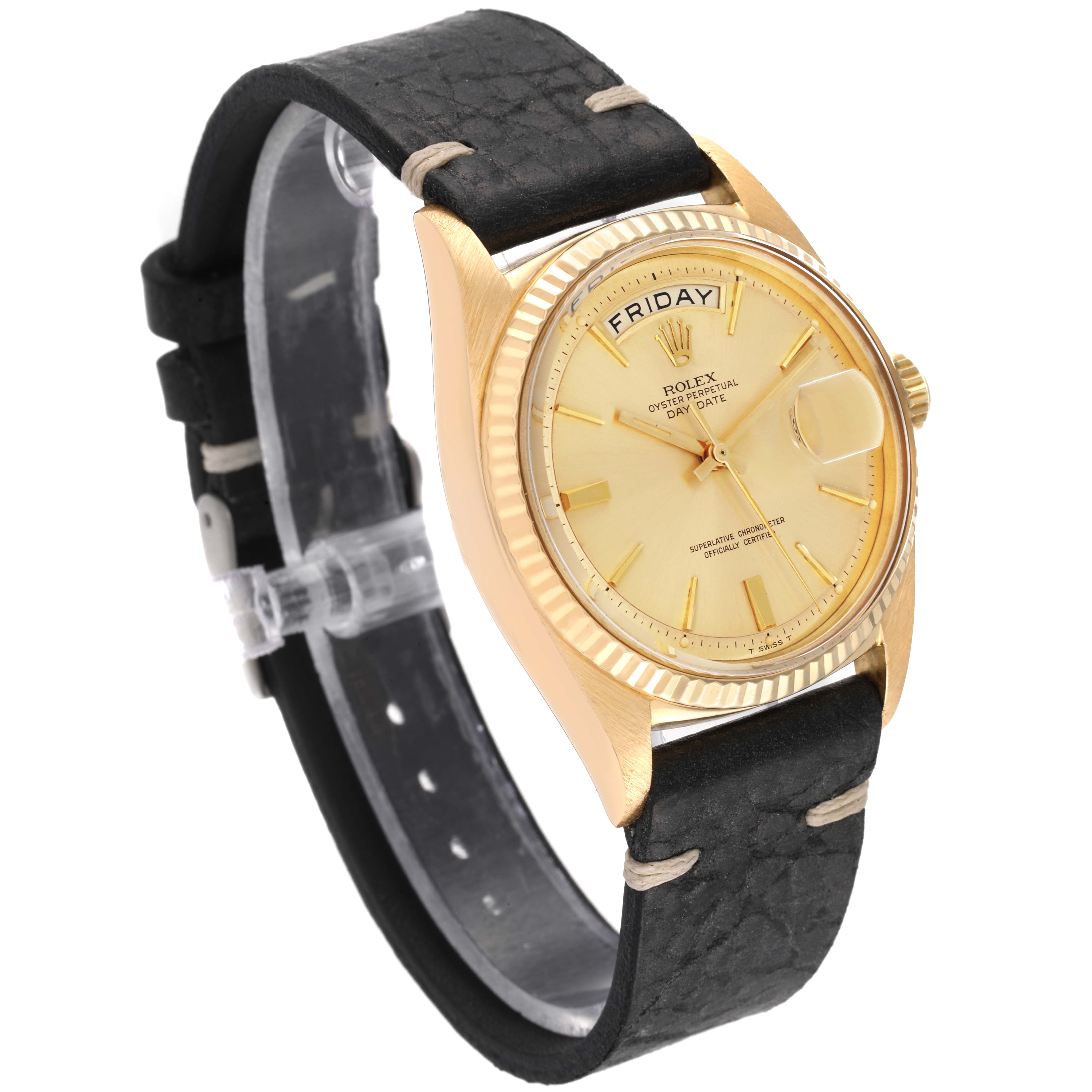 The image shows a Vintage Collection model Rolex watch at a slight side angle, displaying its dial, bezel, crown, and leather strap.