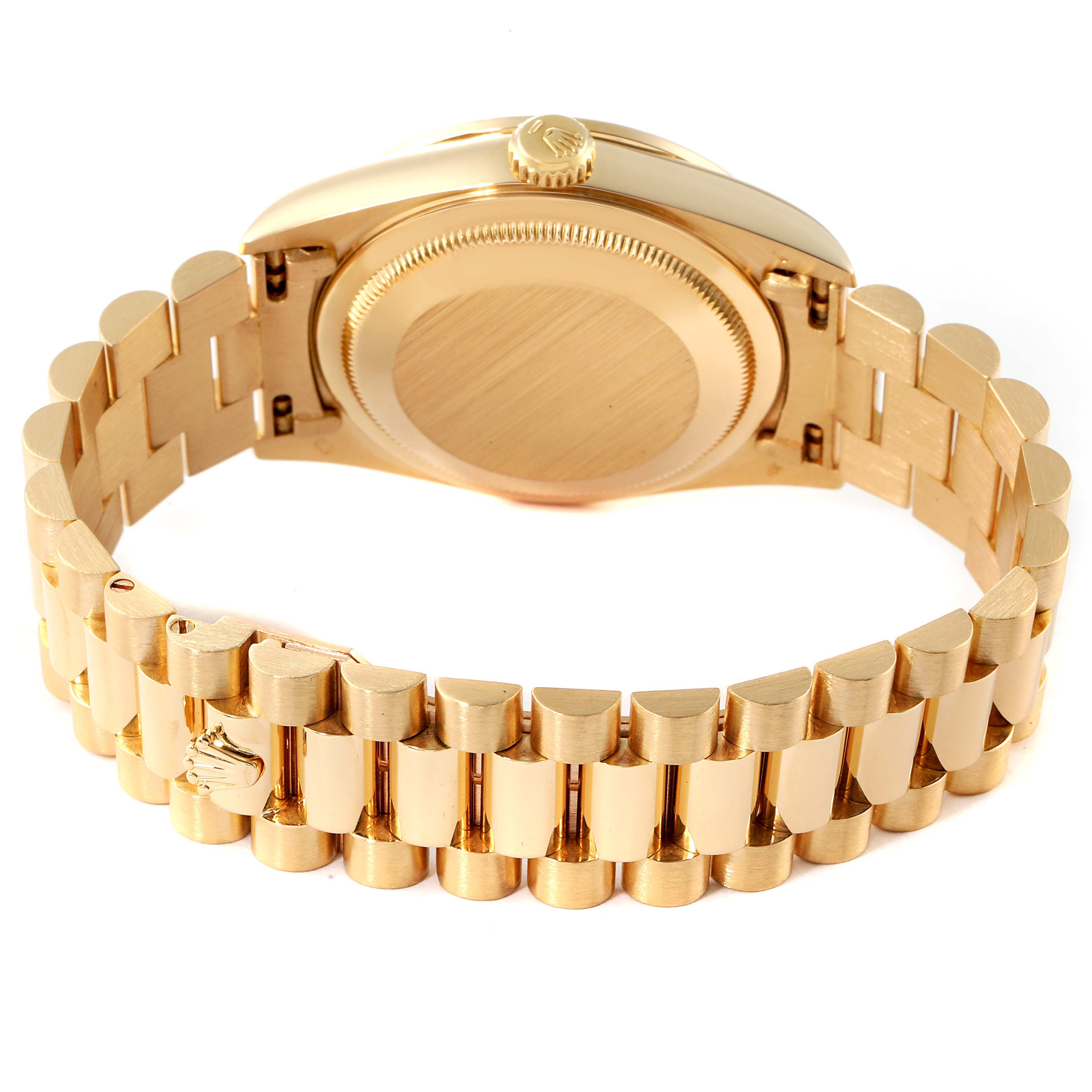 This image shows the back case and bracelet of a Rolex President 18388 Men
s Yellow Gold Champagne Dial 18388 Men
s Yellow Gold Champagne Dial model watch from a rear angle.