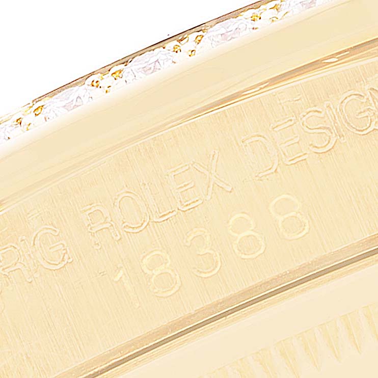 This image shows a close-up of the engraved case side of a Rolex President 18388 Men
s Yellow Gold Champagne Dial 18388 Men
s Yellow Gold Champagne Dial model watch.