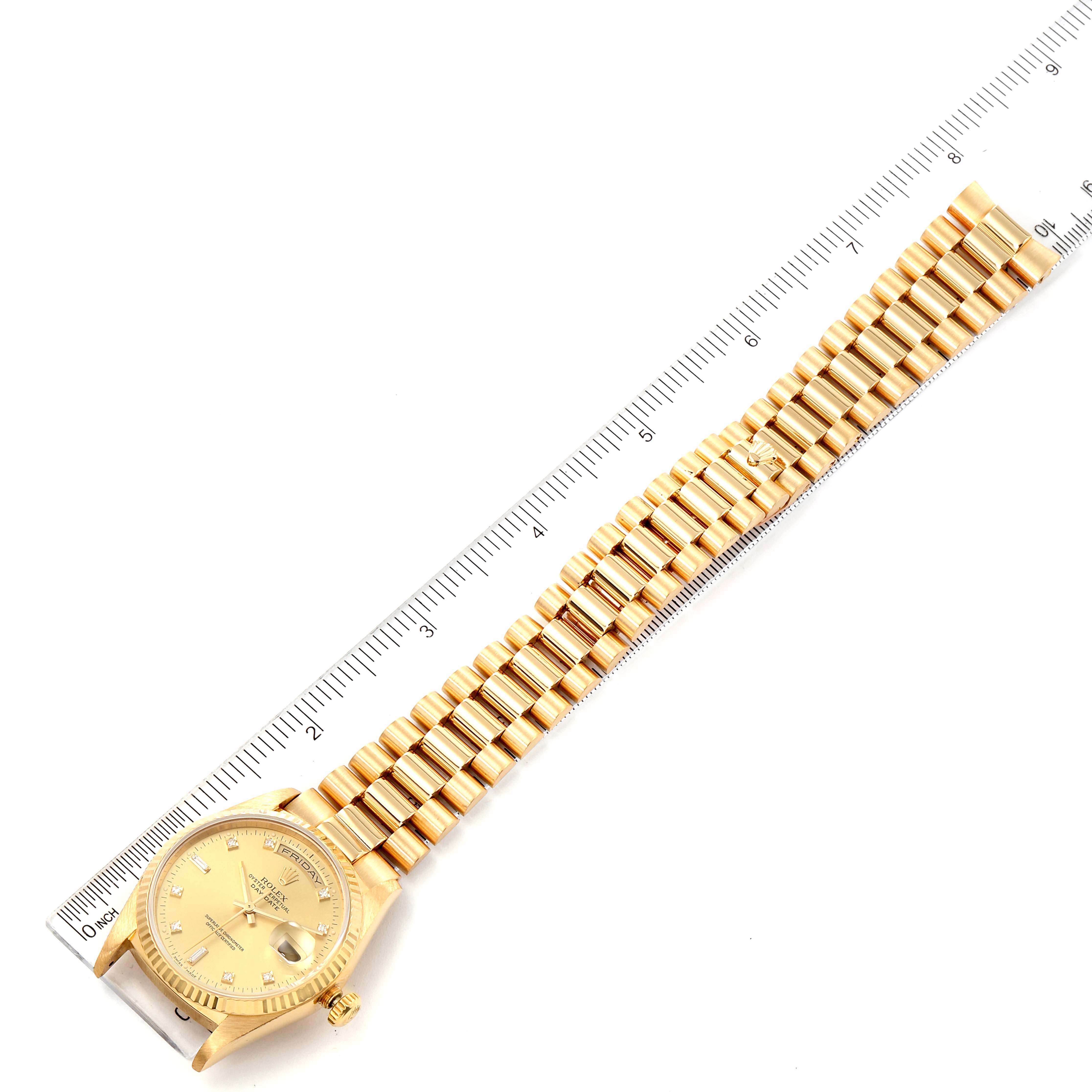 The image shows a top view of the Rolex President 18238 Men's Yellow Gold Champagne Dial 18238 Men's Yellow Gold Champagne Dial model watch with a measuring scale alongside it.