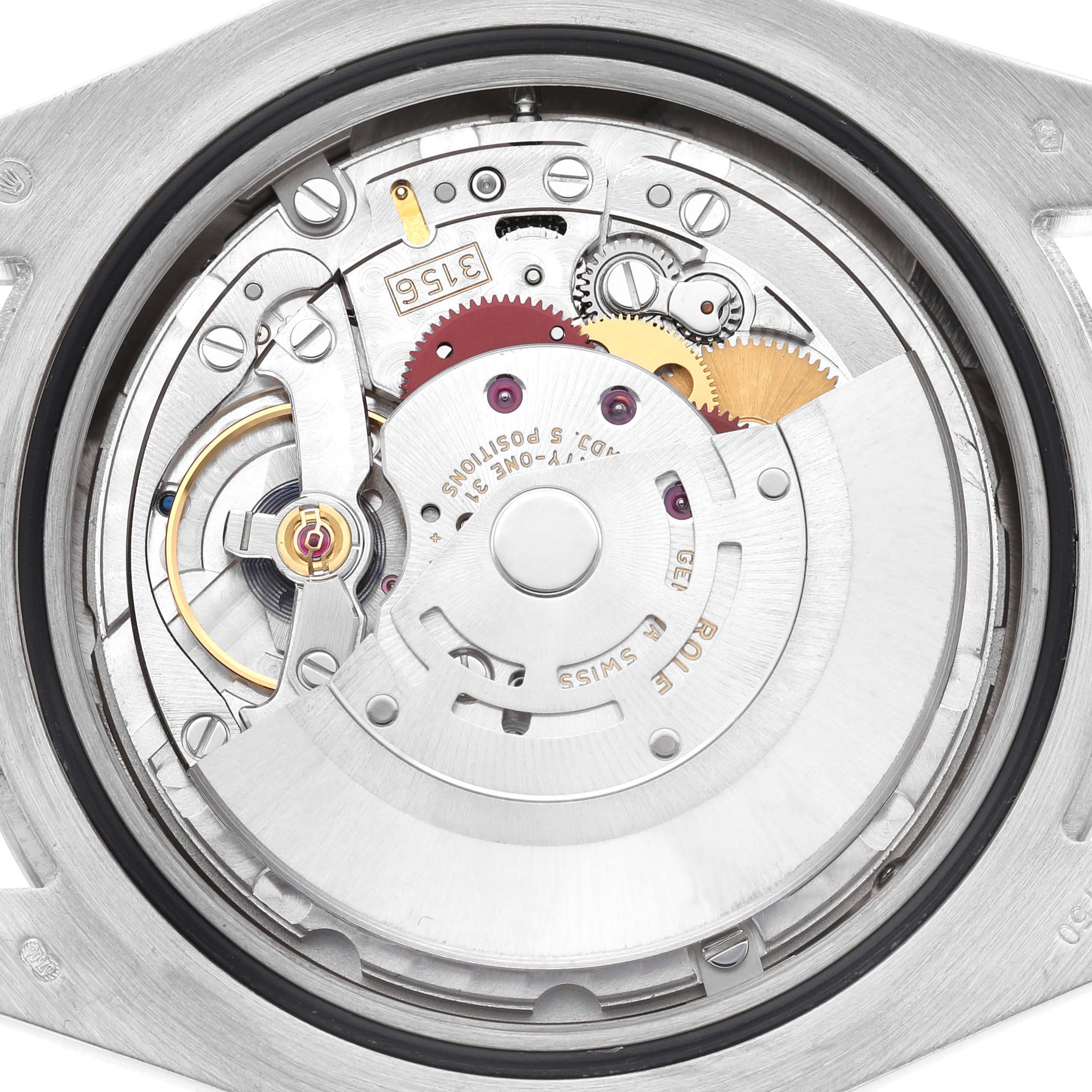 The image shows the internal movement of the Rolex President 218349 Men's White Gold Silver Dial model watch from a top-down angle, highlighting the gears and rotor.