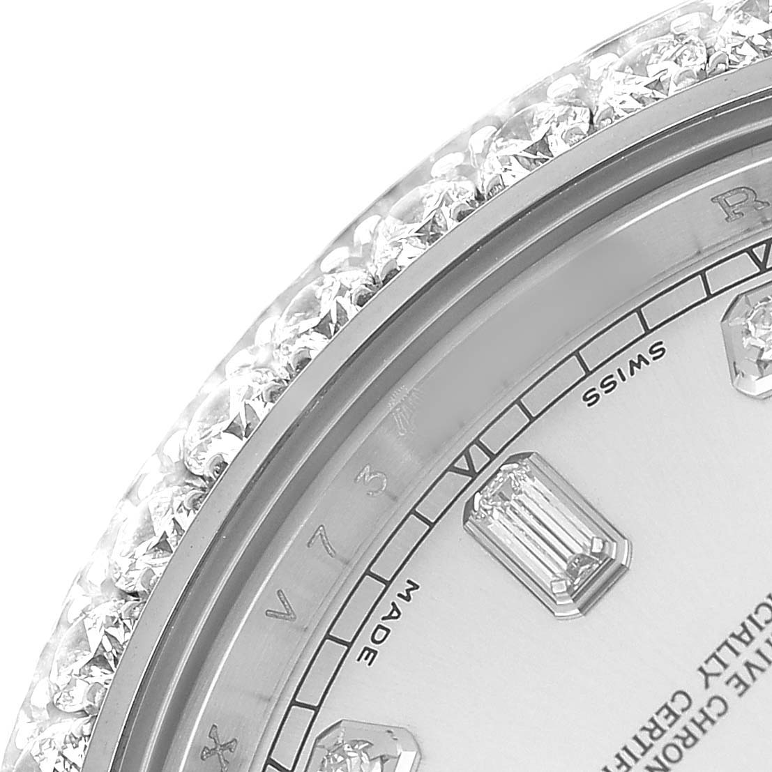 The image shows a close-up of the diamond-encrusted bezel and dial of a Rolex President 218349 Men's White Gold Silver Dial model watch.