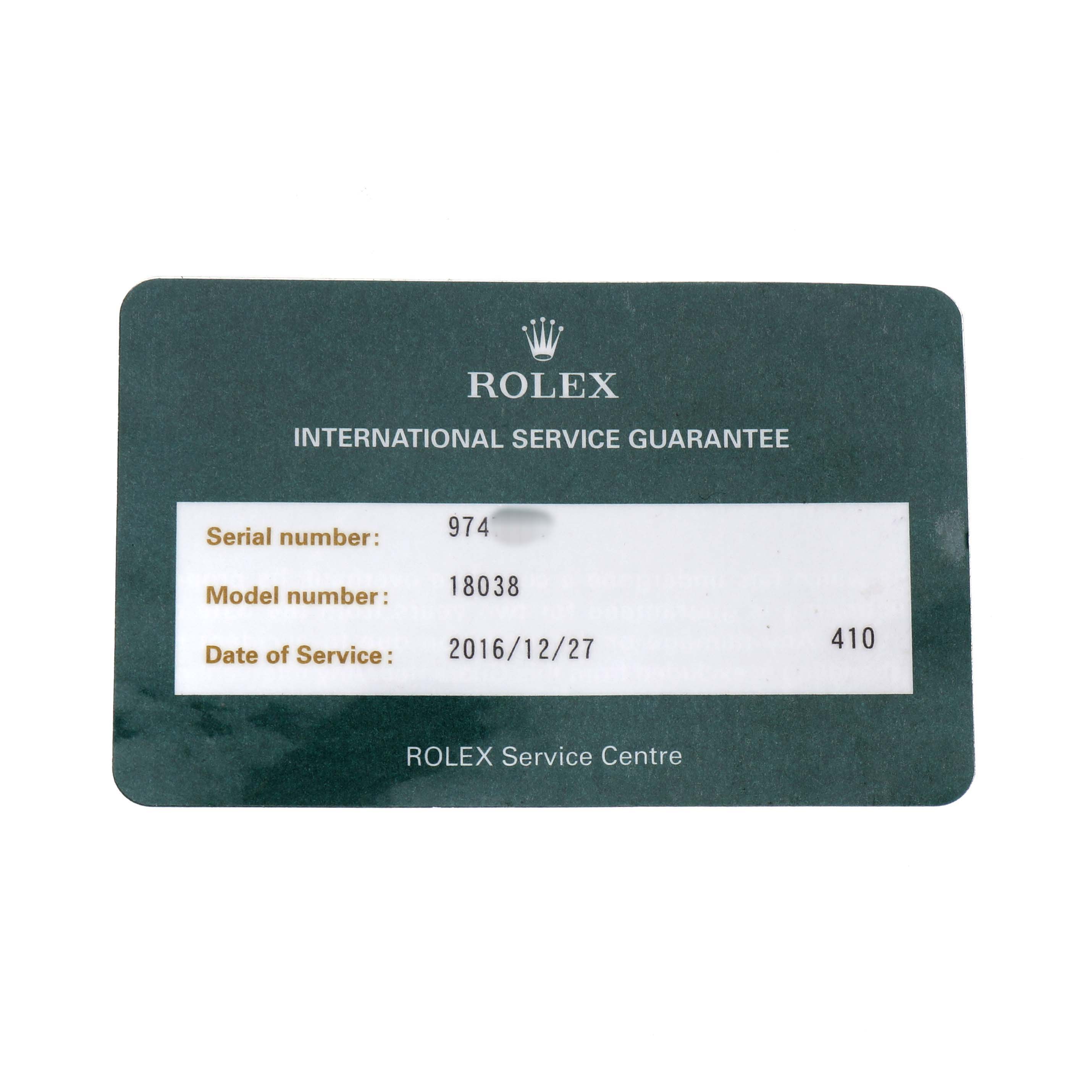 The image shows a Rolex service guarantee card for the President model, providing service details and model number.