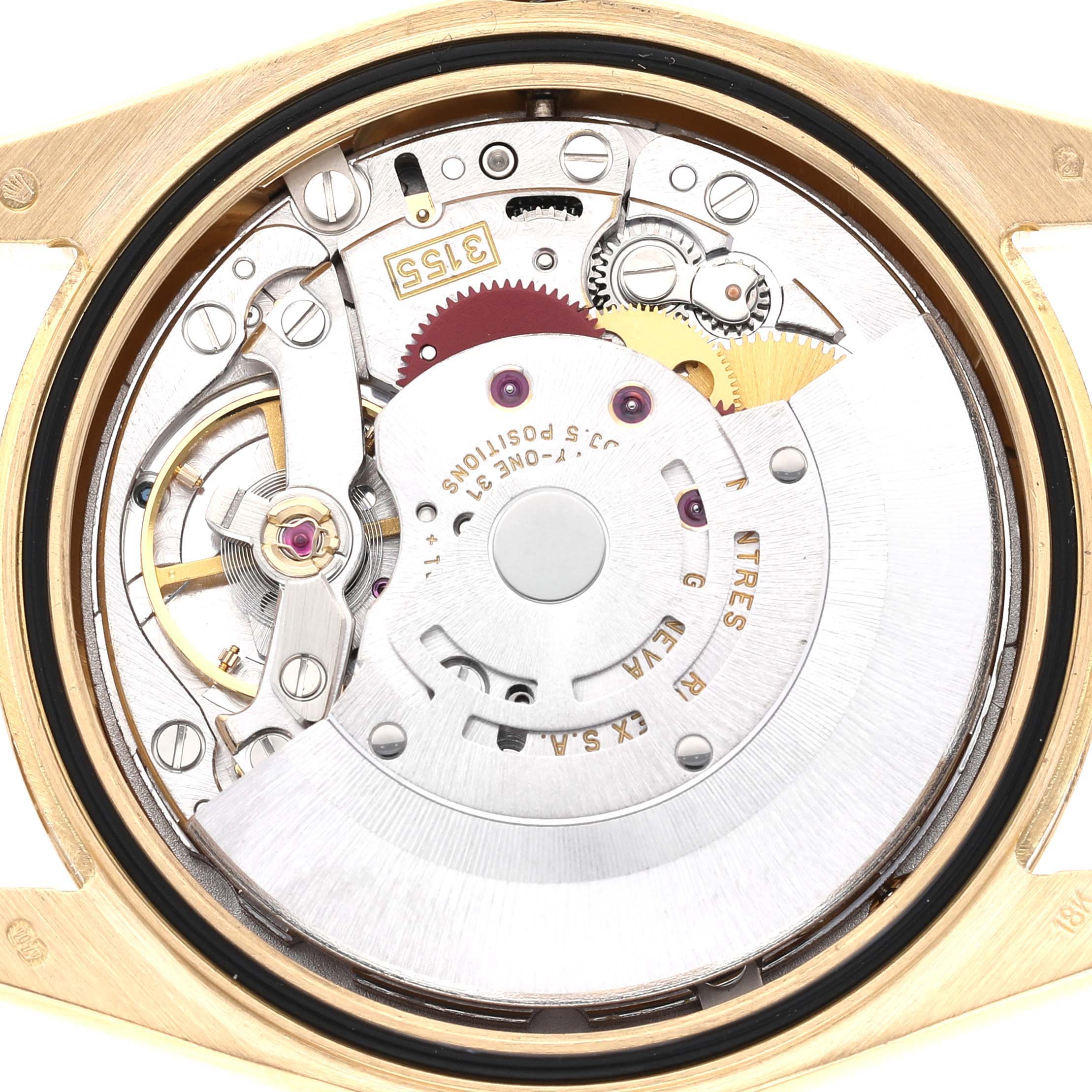 The image shows the internal mechanism of a Rolex President 36 Men's Yellow Gold Silver Dial watch from a top-down angle.