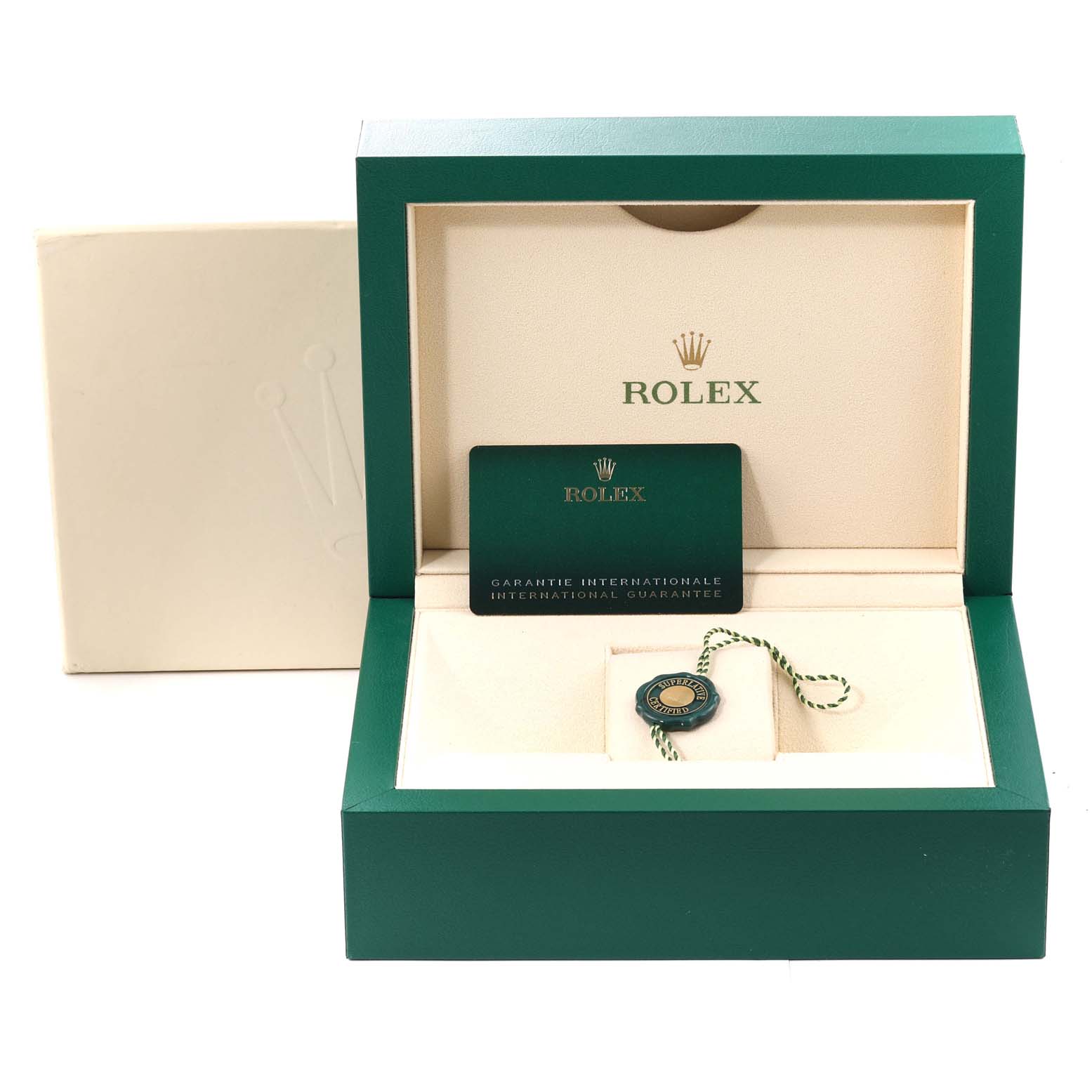 The image shows an open Rolex box with a warranty card and tag for the Sea-Dweller model, viewed from the front.