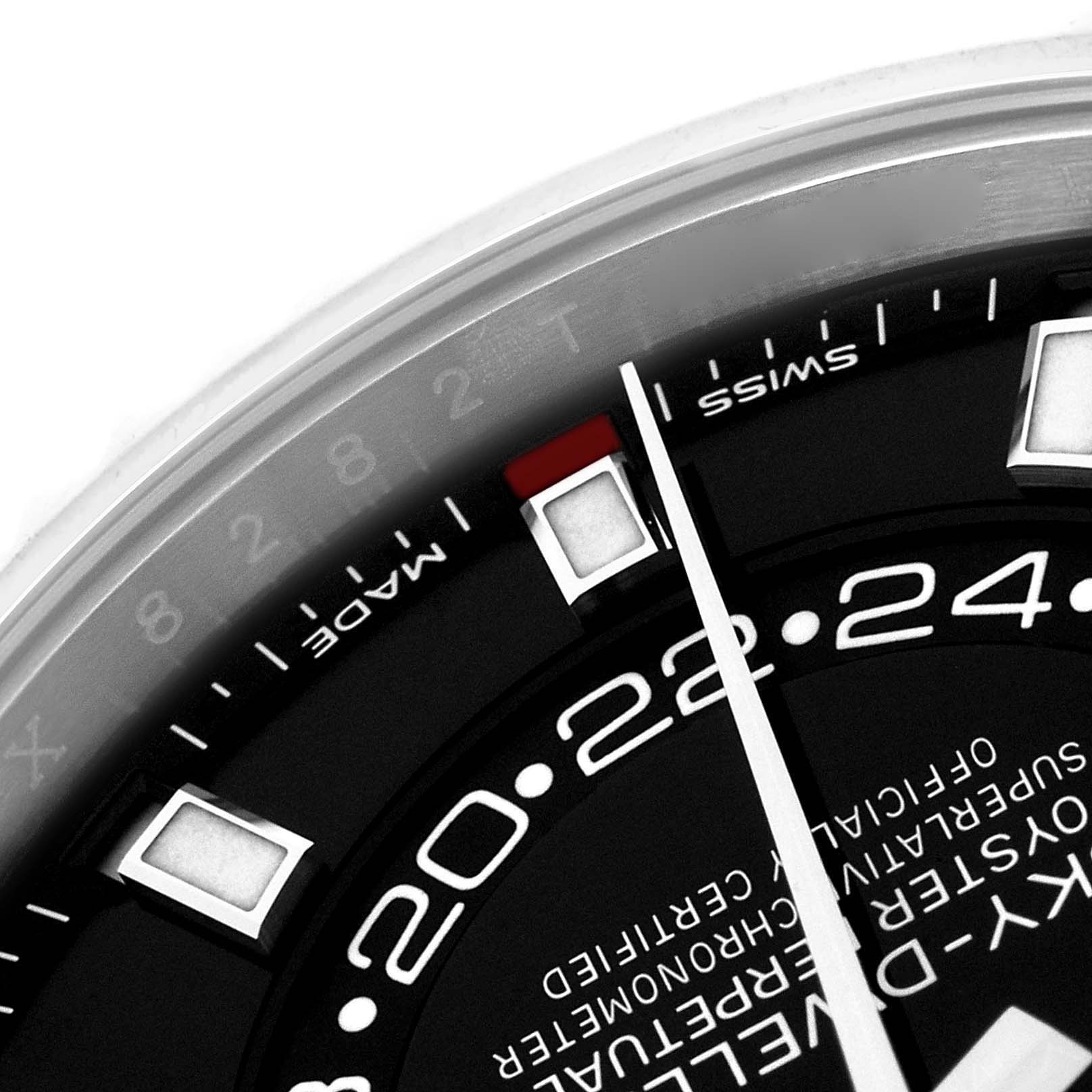 The image shows a close-up of the dial and bezel of a Rolex Sky-Dweller 326934 Men's Stainless Steel Black Dial, highlighting the 24-hour disc and markers.