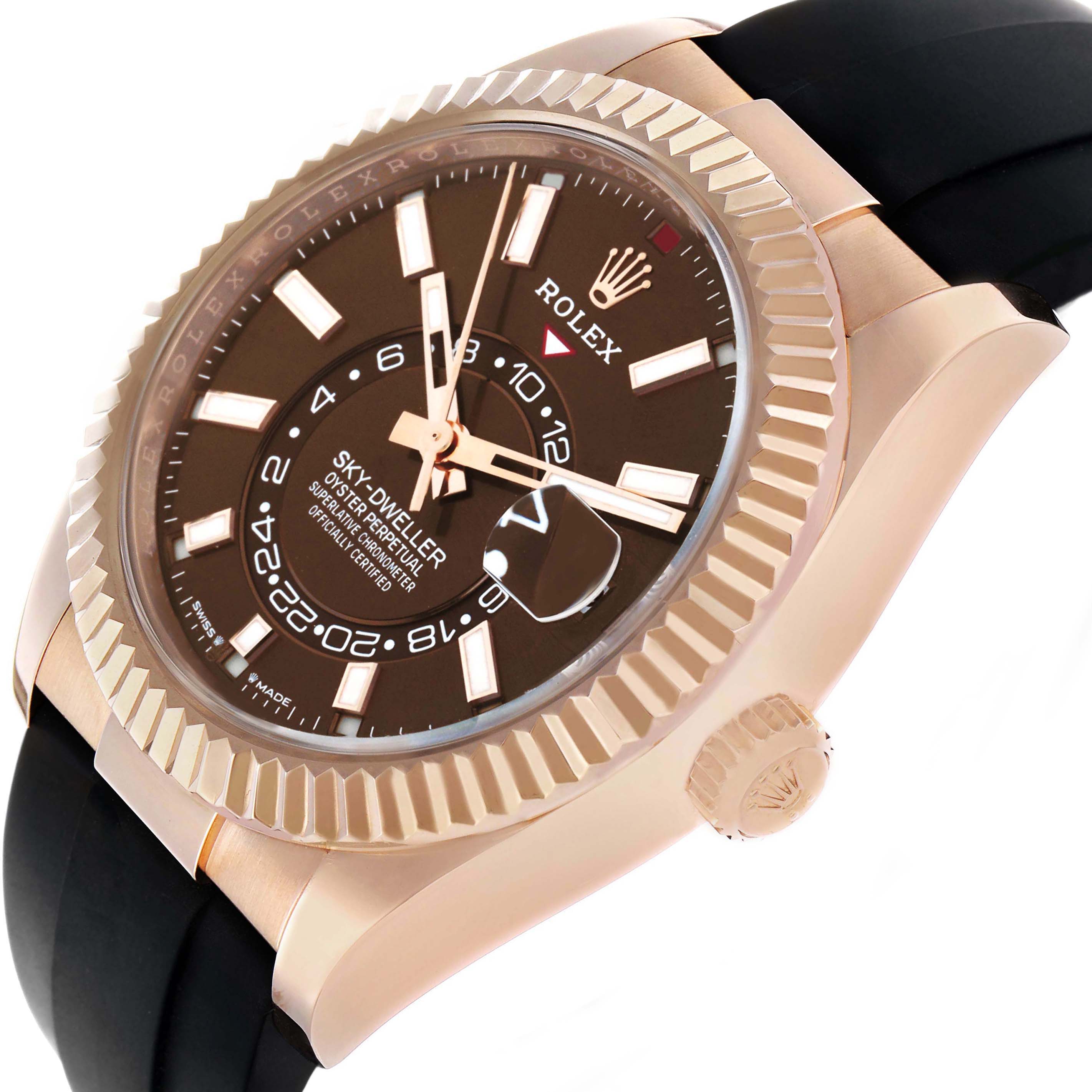 The image shows a Rolex Sky-Dweller watch at an angled top view, highlighting the bezel, dial, crown, and part of the strap.