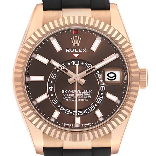 This is a Rolex Sky-Dweller, showing a close-up of its face, bezel, crown, strap, and date window from the front angle.