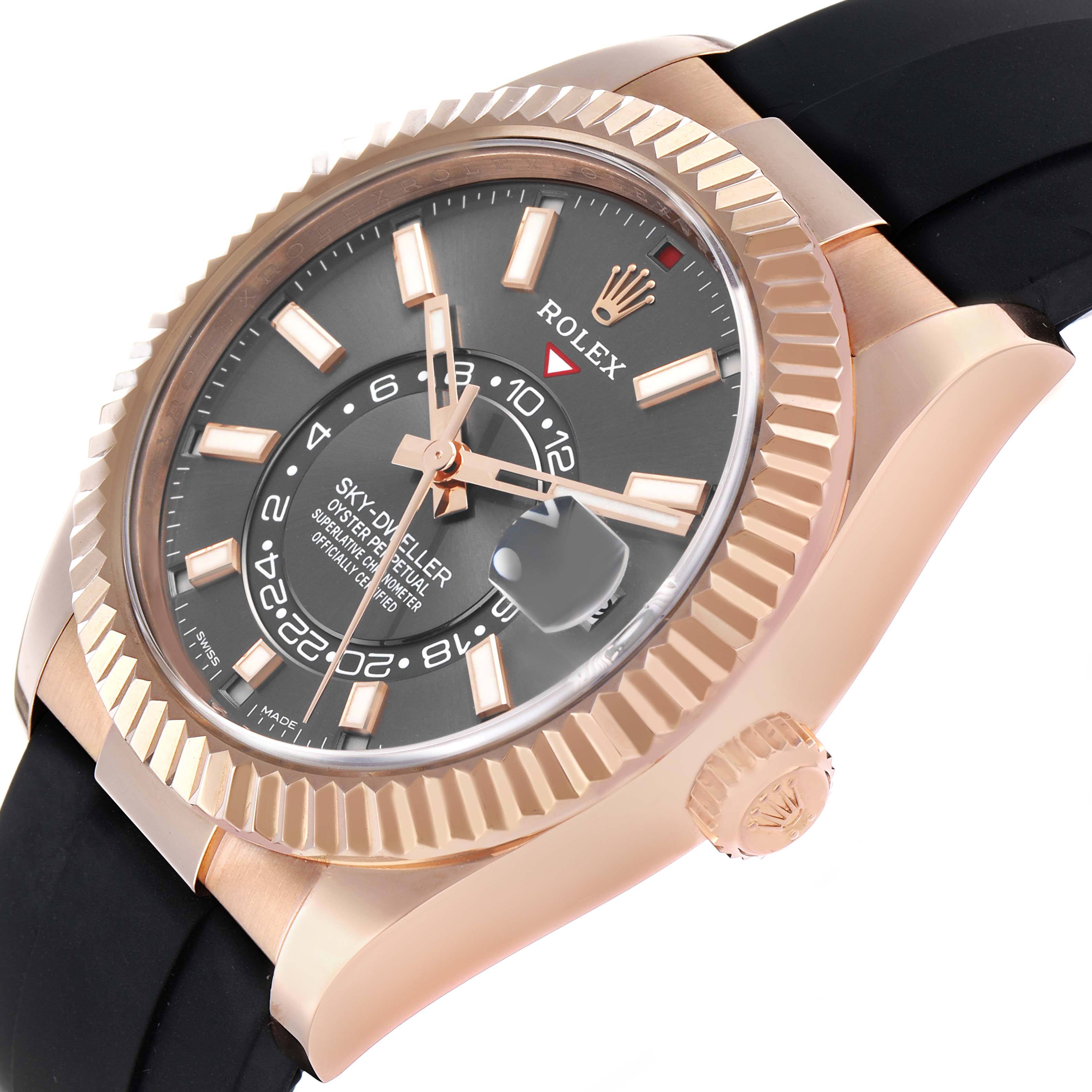 The Rolex Sky-Dweller 326235 Men's Rose Gold Grey Dial watch is shown at an angle highlighting the bezel, crown, and dial with a rubber strap.