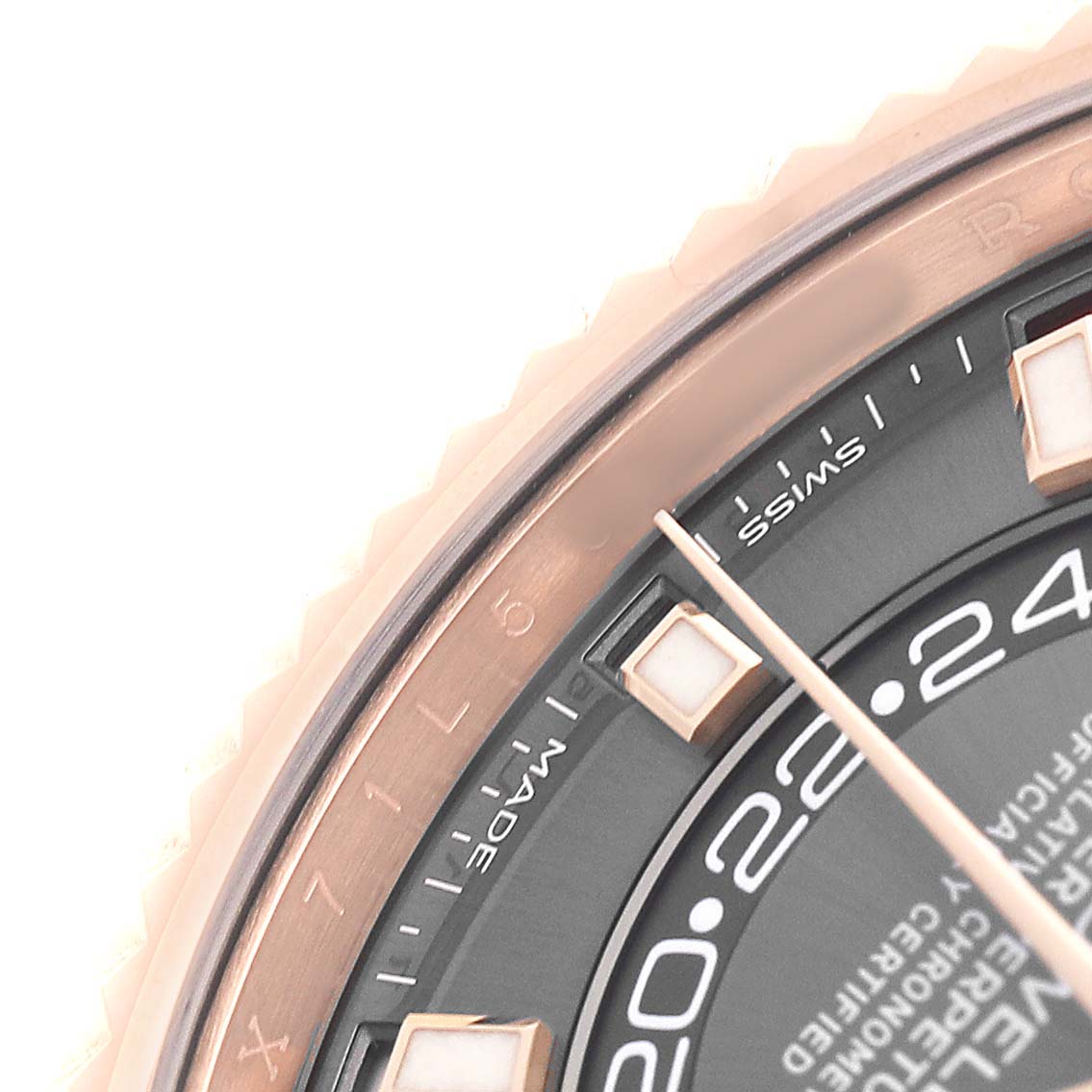 The image shows a close-up of the dial and bezel of a Rolex Sky-Dweller 326235 Men's Rose Gold Grey Dial, highlighting the markers and hands.