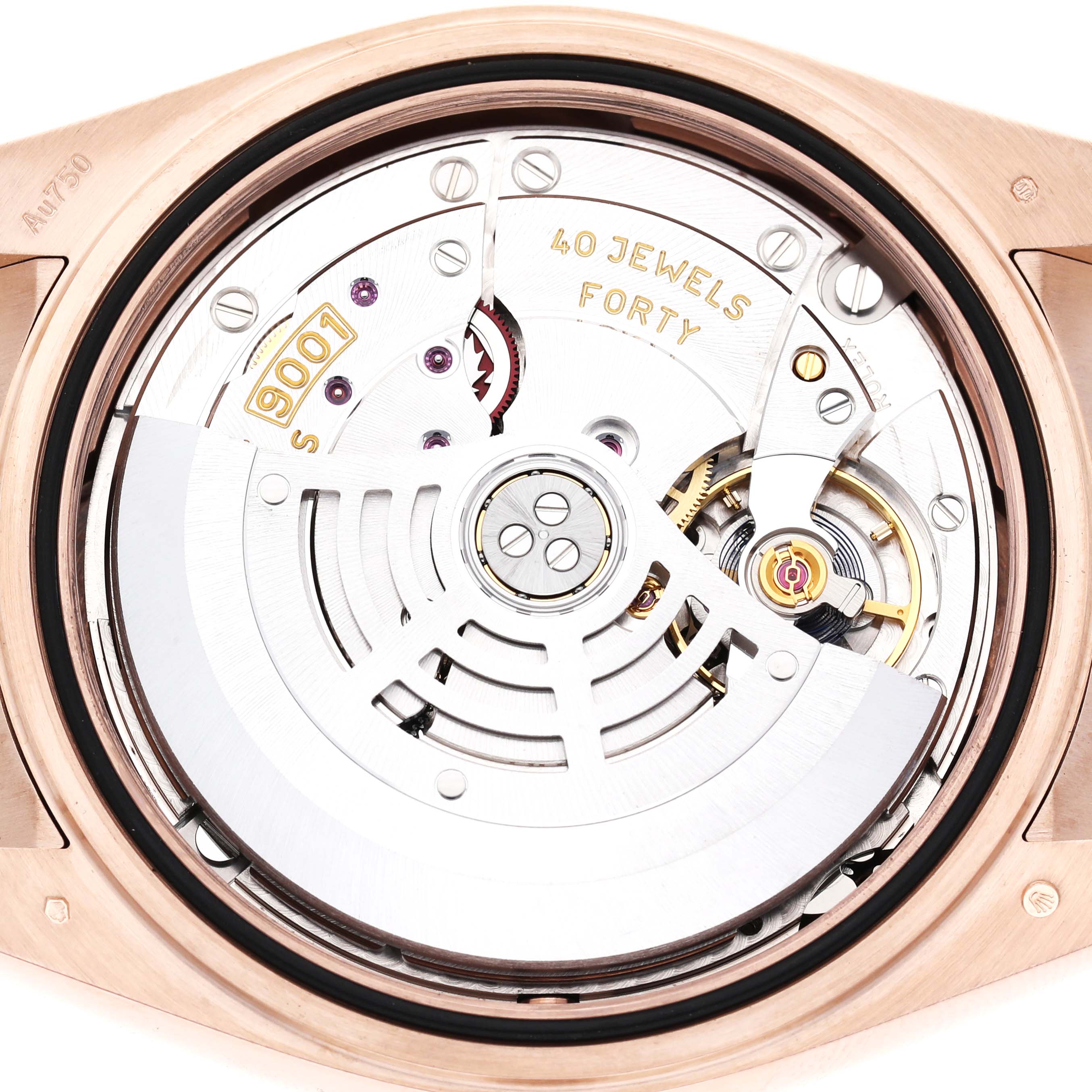 The image shows the movement of a Rolex Sky-Dweller 326235 Men's Rose Gold Grey Dial watch from a rear angle, highlighting its rotor and engravings.