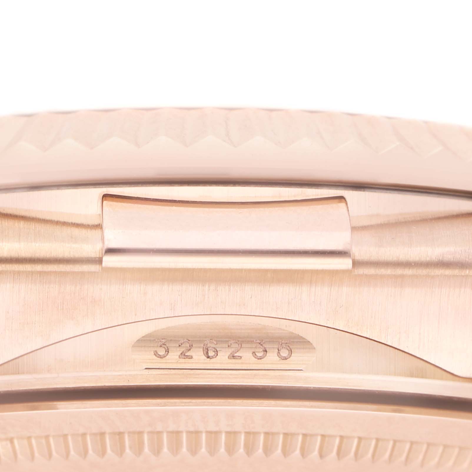 The image shows a close-up side view of the Rolex Sky-Dweller 326235 Men's Rose Gold Grey Dial's case edge and serial number.