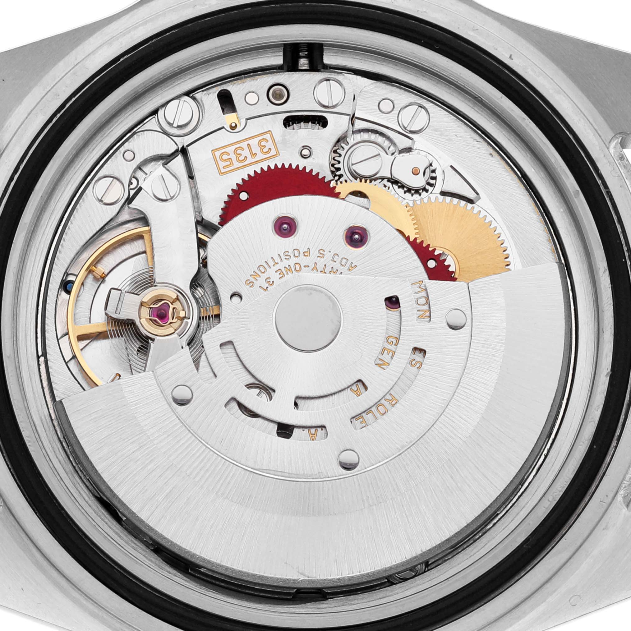 This image shows the internal movement mechanism of the Rolex Submariner 16613 Men
s Steel and Gold (two tone) Blue Dial 16613 Men
s Steel and Gold (two tone) Blue Dial watch from a back view angle.