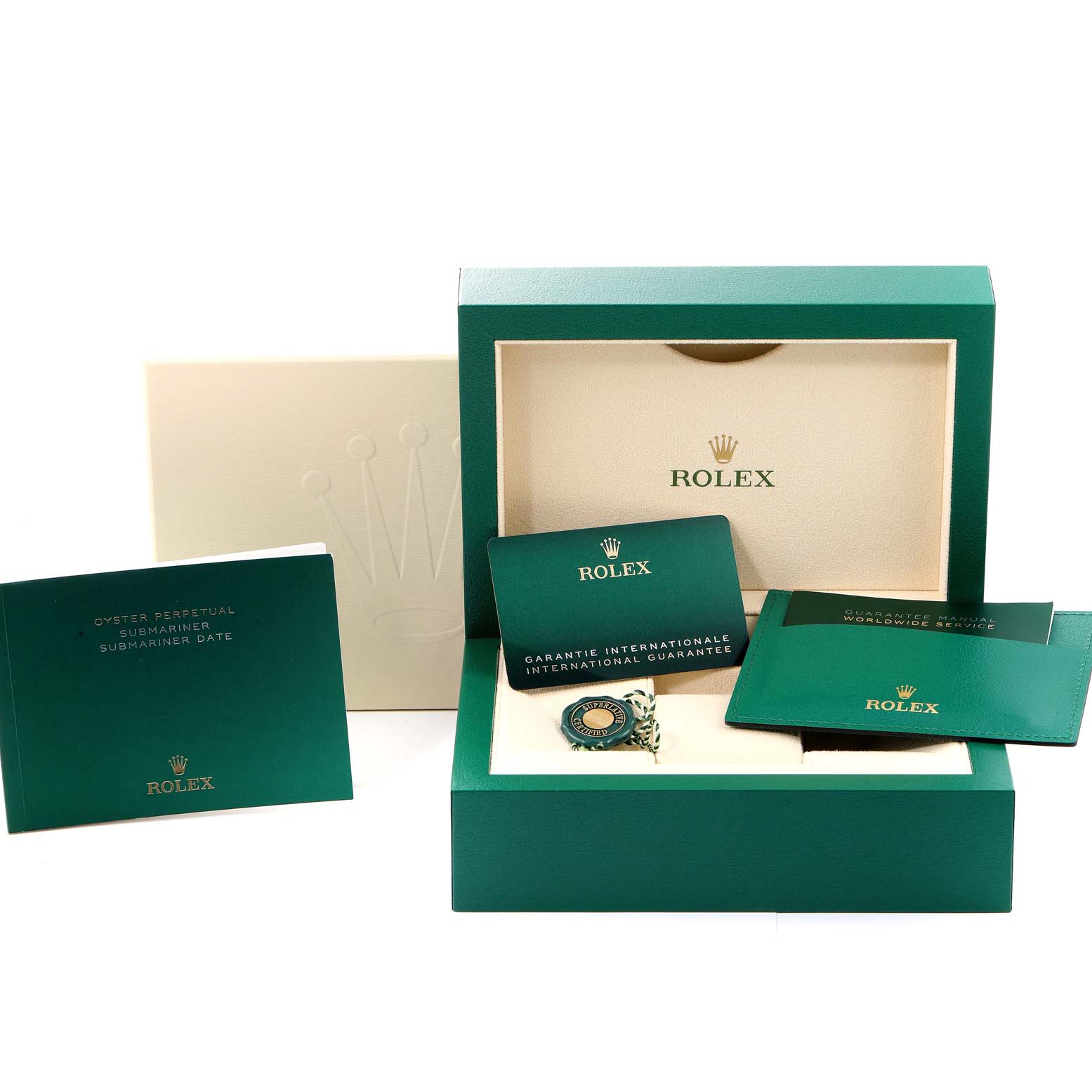 This image shows the Rolex Submariner 126610 Men
s Stainless Steel Black Dial 126610 Men
s Stainless Steel Black Dial in its original green box, along with branded booklets and guarantee cards.