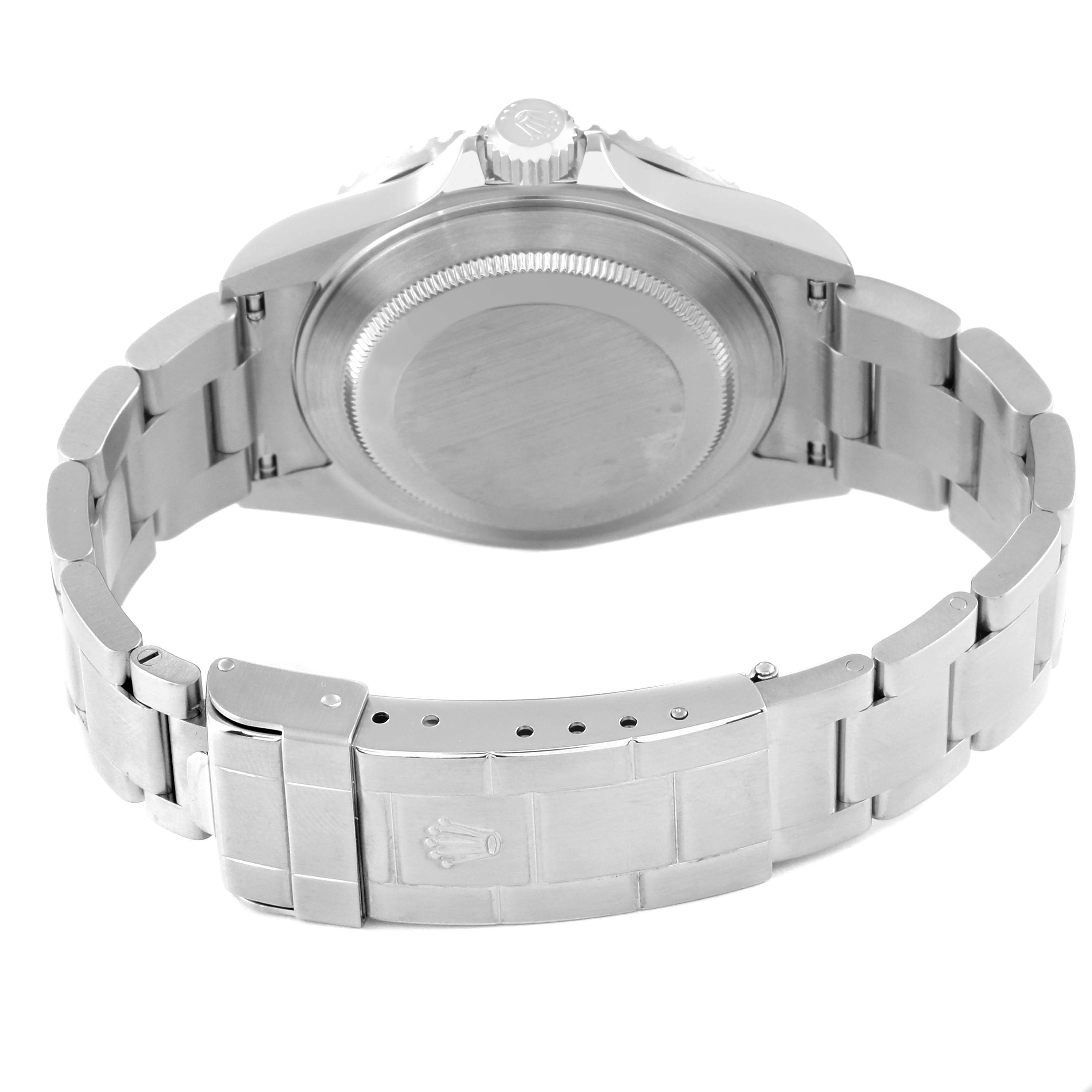 The image shows the back view of a Rolex Submariner 16610 Men
s Stainless Steel Black Dial 16610 Men
s Stainless Steel Black Dial watch, highlighting its case back, crown, and bracelet clasp.