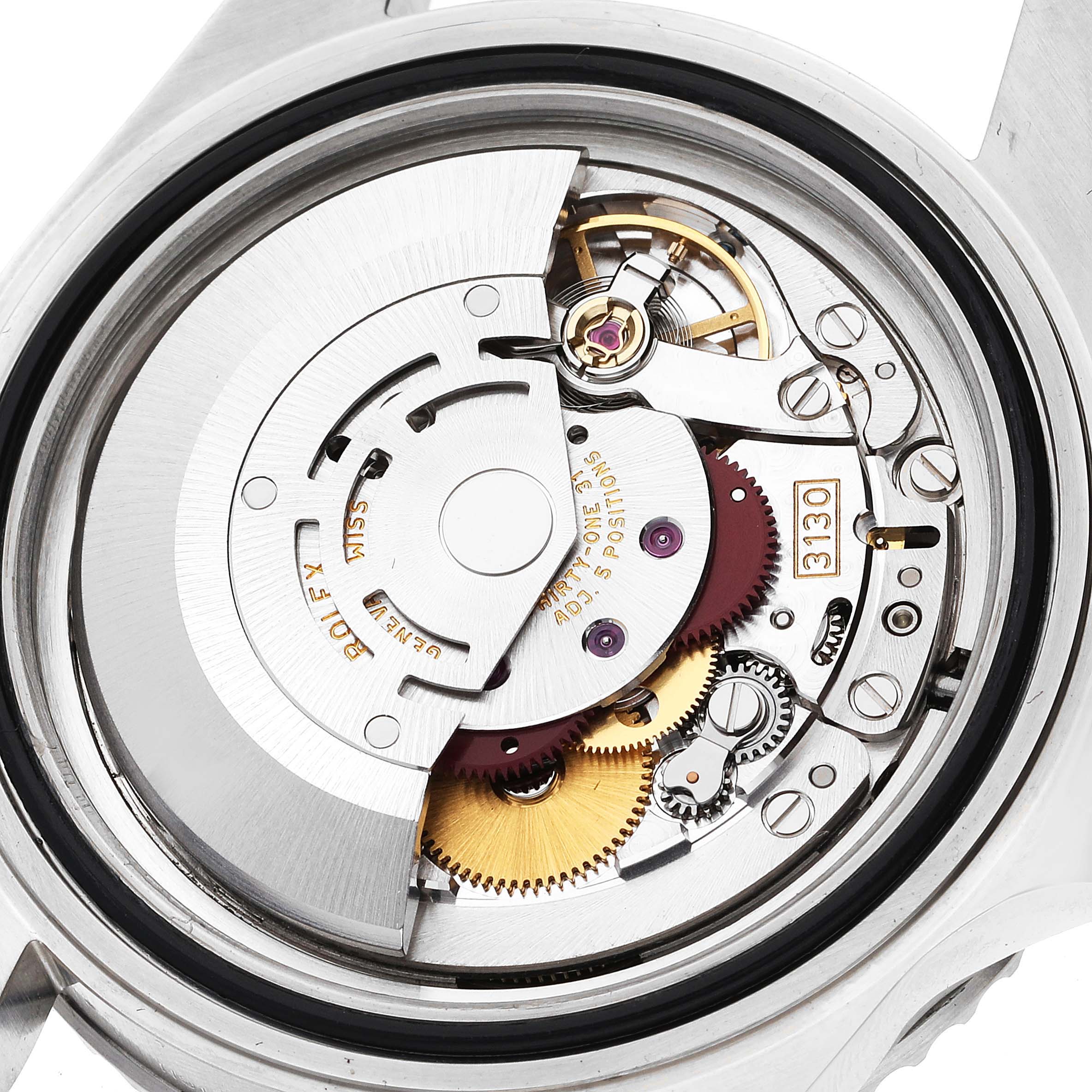 The image shows a close-up view of the movement and internal mechanisms of a Rolex Submariner 14060M Men's Stainless Steel Black Dial 14060M Men's Stainless Steel Black Dial watch.