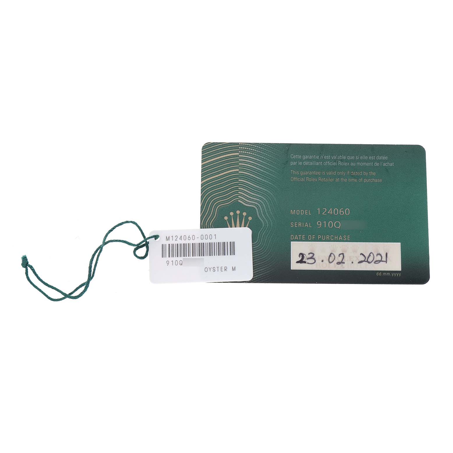 The image shows a warranty card and tag for a Rolex Submariner M124060-0001 Men's Stainless Steel Black Dial, model 124060, with serial information.