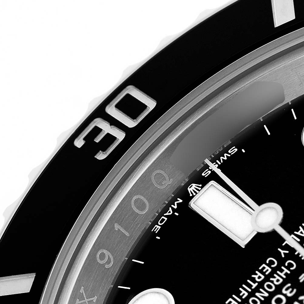 The image shows a close-up of the bezel and dial, focusing on details with the "30" marking of the Rolex Submariner M124060-0001 Men's Stainless Steel Black Dial.