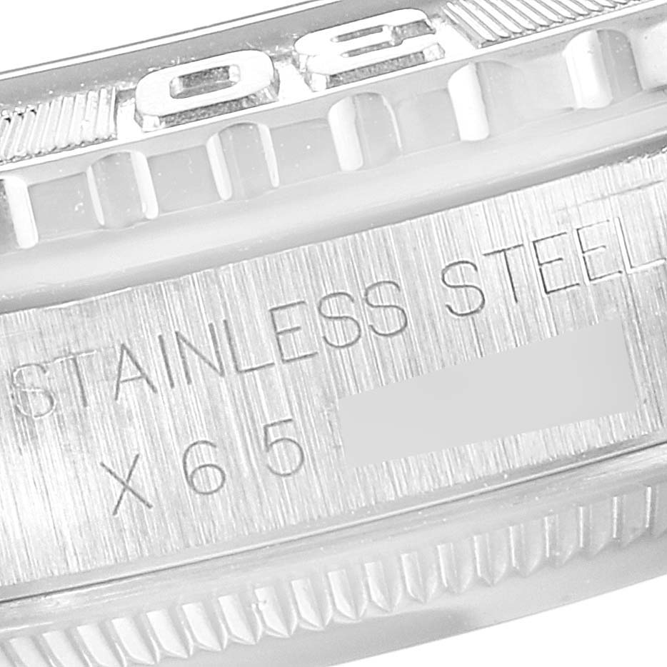The image shows a close-up of the stainless steel bezel and edge of the Turn-o-Graph model by Rolex.