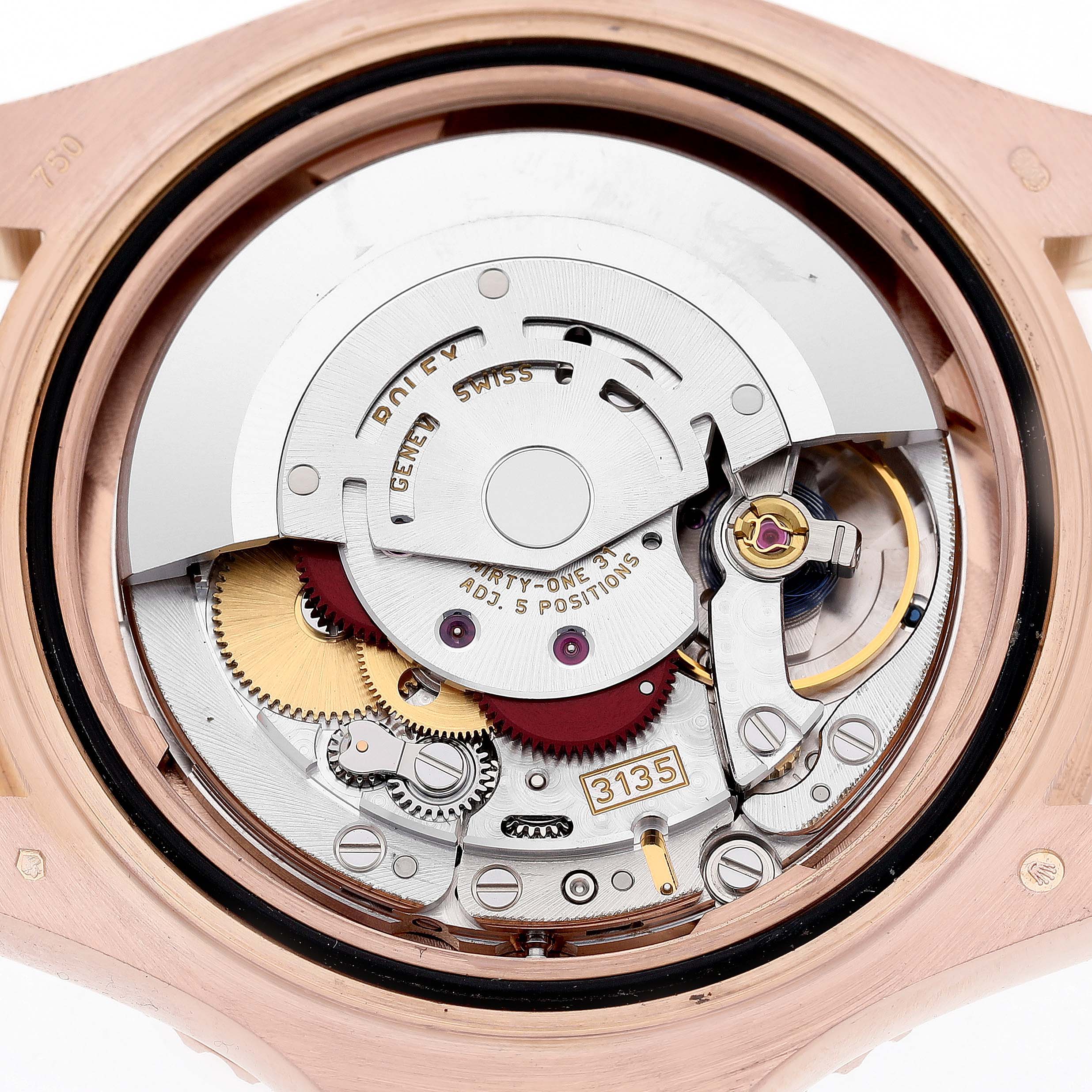 This image shows the Rolex Yacht-Master 116655 Women's Rose Gold Black Dial's movement from a top-down angle, highlighting internal gears and the rotor.