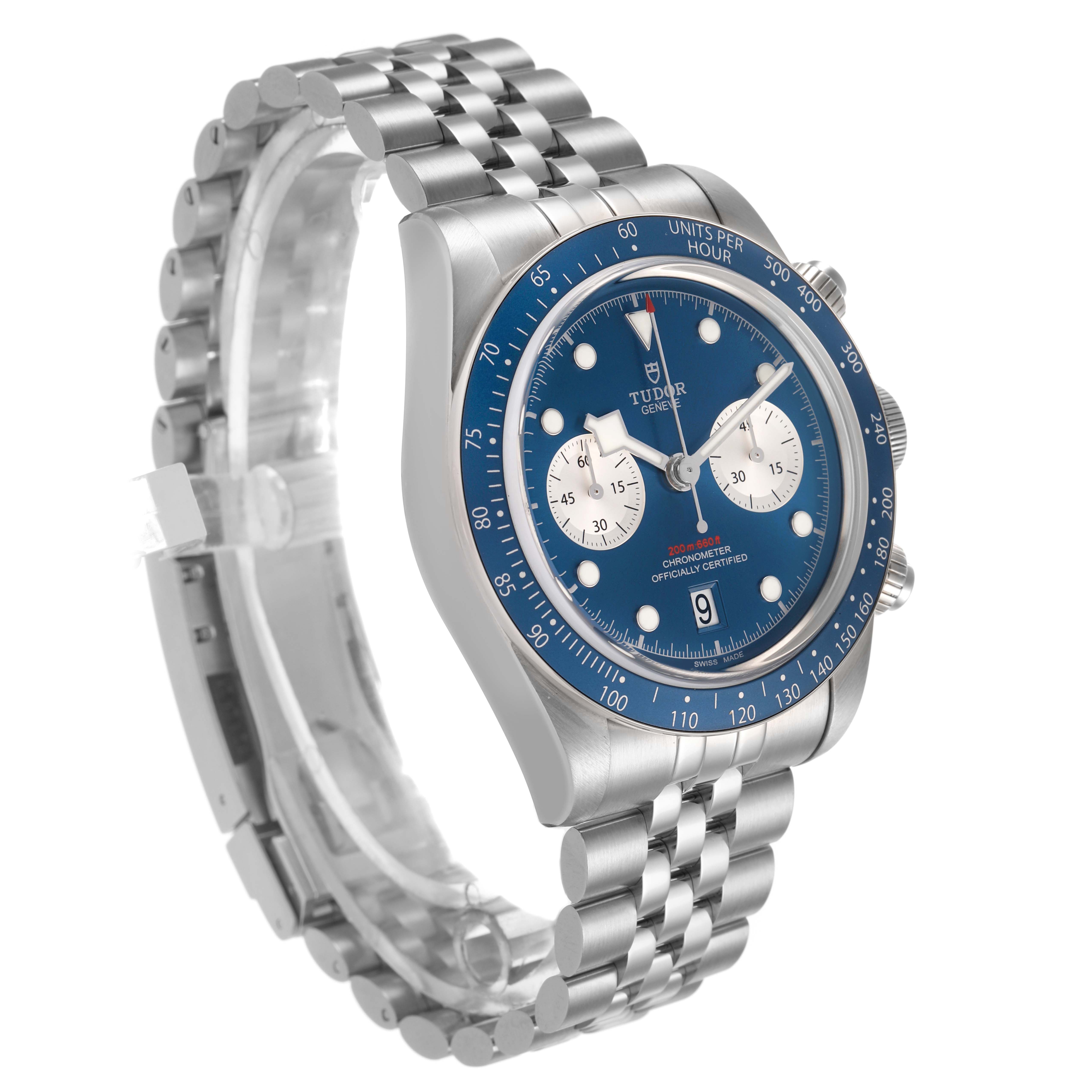 The Tudor Heritage Black Bay M79360B-0002 Men's Stainless Steel Blue Dial watch is shown at a side angle, highlighting the blue dial, bezel, and stainless steel bracelet.