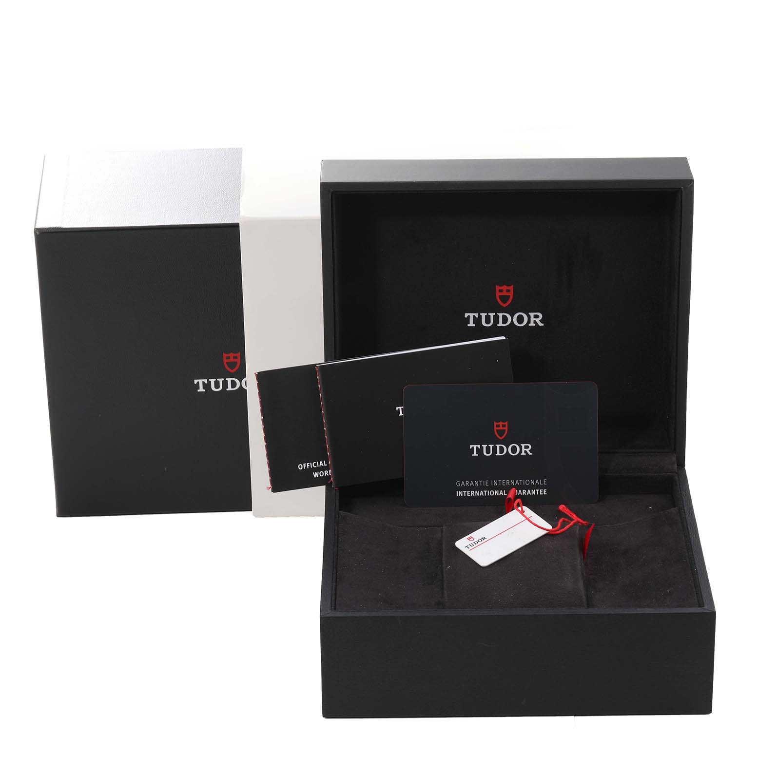 The image shows the packaging, warranty booklet, cards, and tag of a Tudor Heritage Black Bay M79470 Men's Stainless Steel Black Dial M79470 Men's Stainless Steel Black Dial watch.