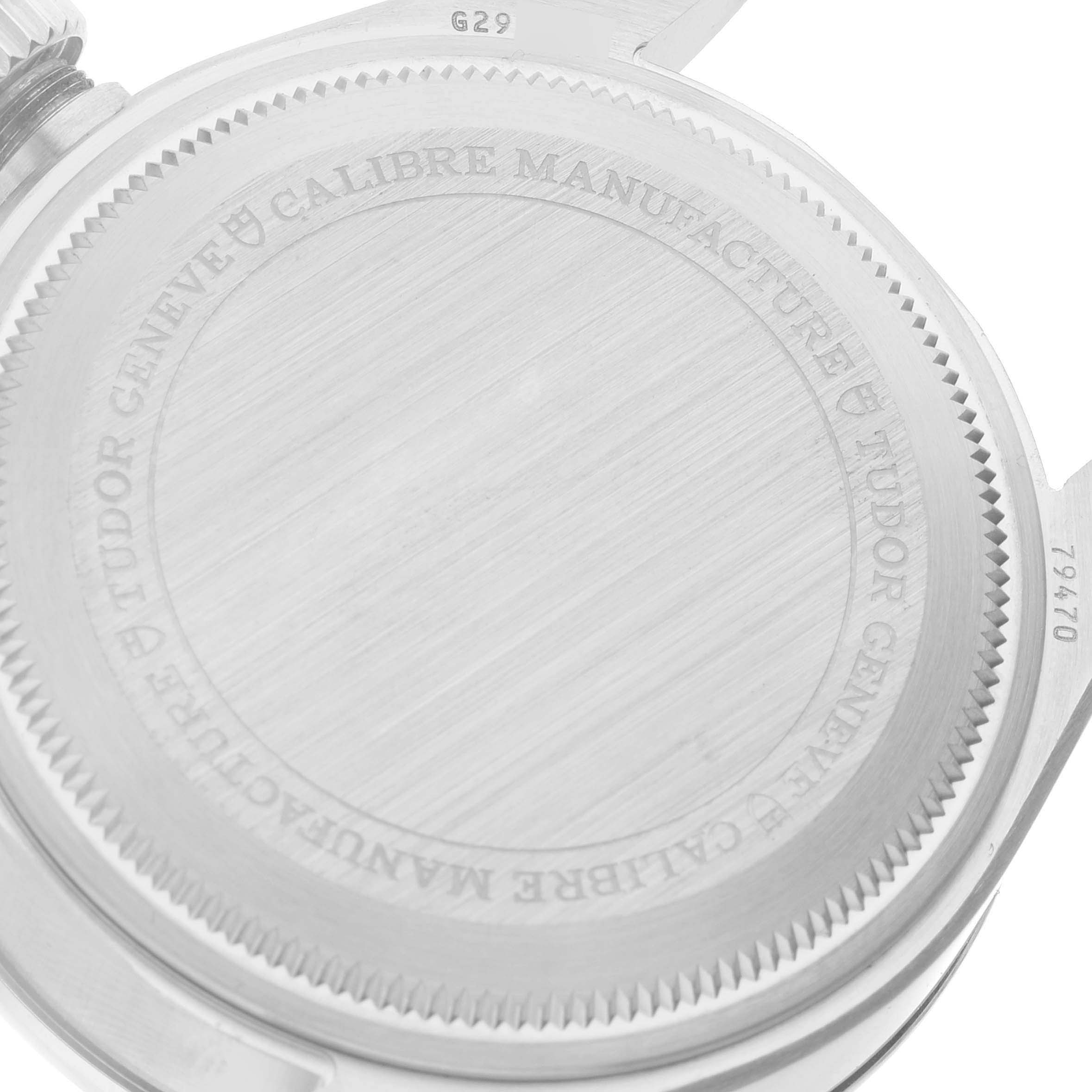 This image shows the caseback of the Tudor Heritage Black Bay M79470 Men's Stainless Steel Black Dial M79470 Men's Stainless Steel Black Dial watch, highlighting the engravings and crown.