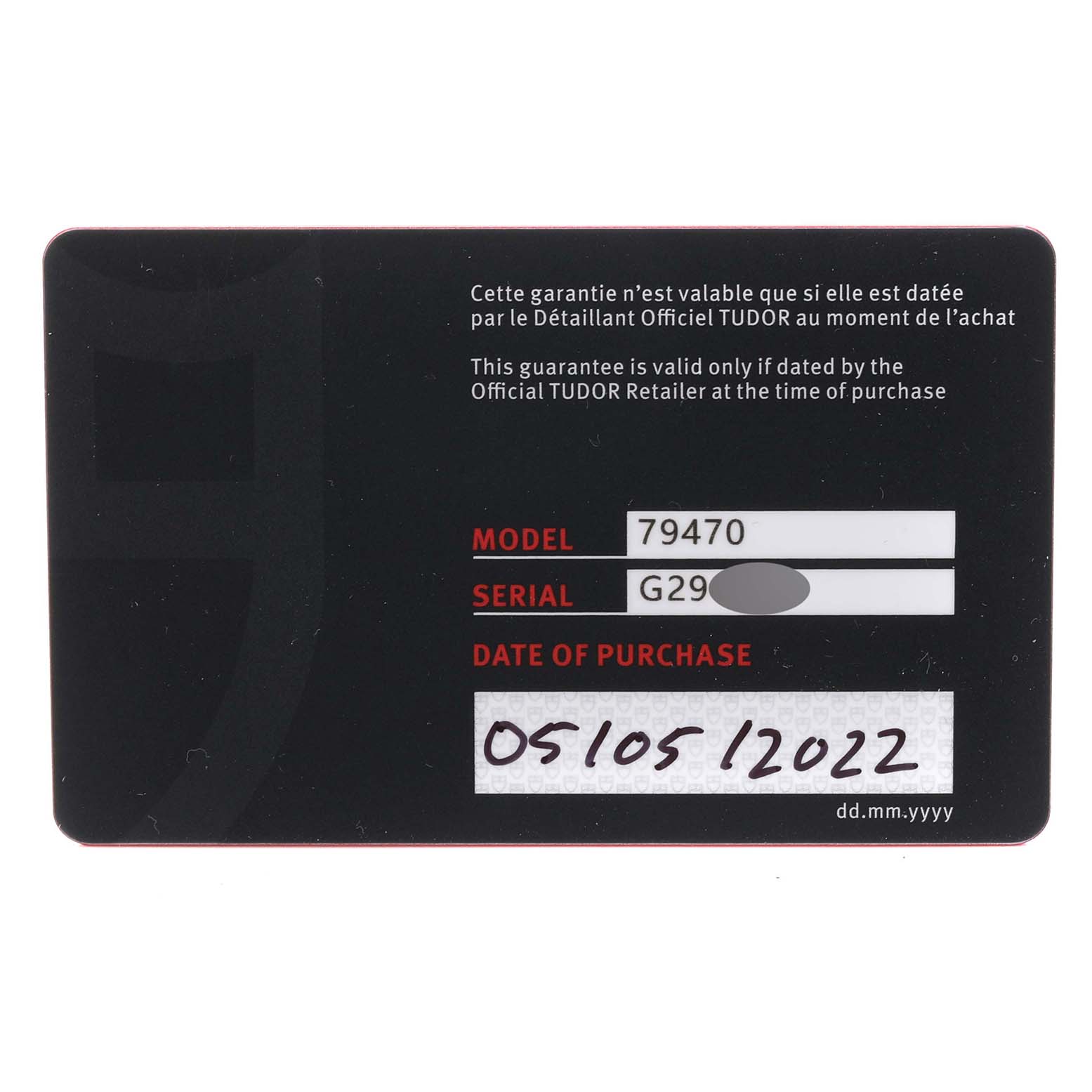 This image shows the warranty card for the Tudor Heritage Black Bay M79470 Men's Stainless Steel Black Dial M79470 Men's Stainless Steel Black Dial model 79470 watch, displaying model, serial number, and purchase date.