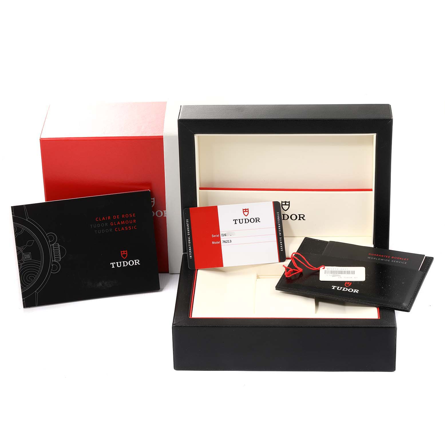 This image shows the packaging, user manual, warranty card, and box for the Tudor Prince 76213 Men's Steel and Gold (two tone) Champagne Dial 76213 Men's Steel and Gold (two tone) Champagne Dial model watch.