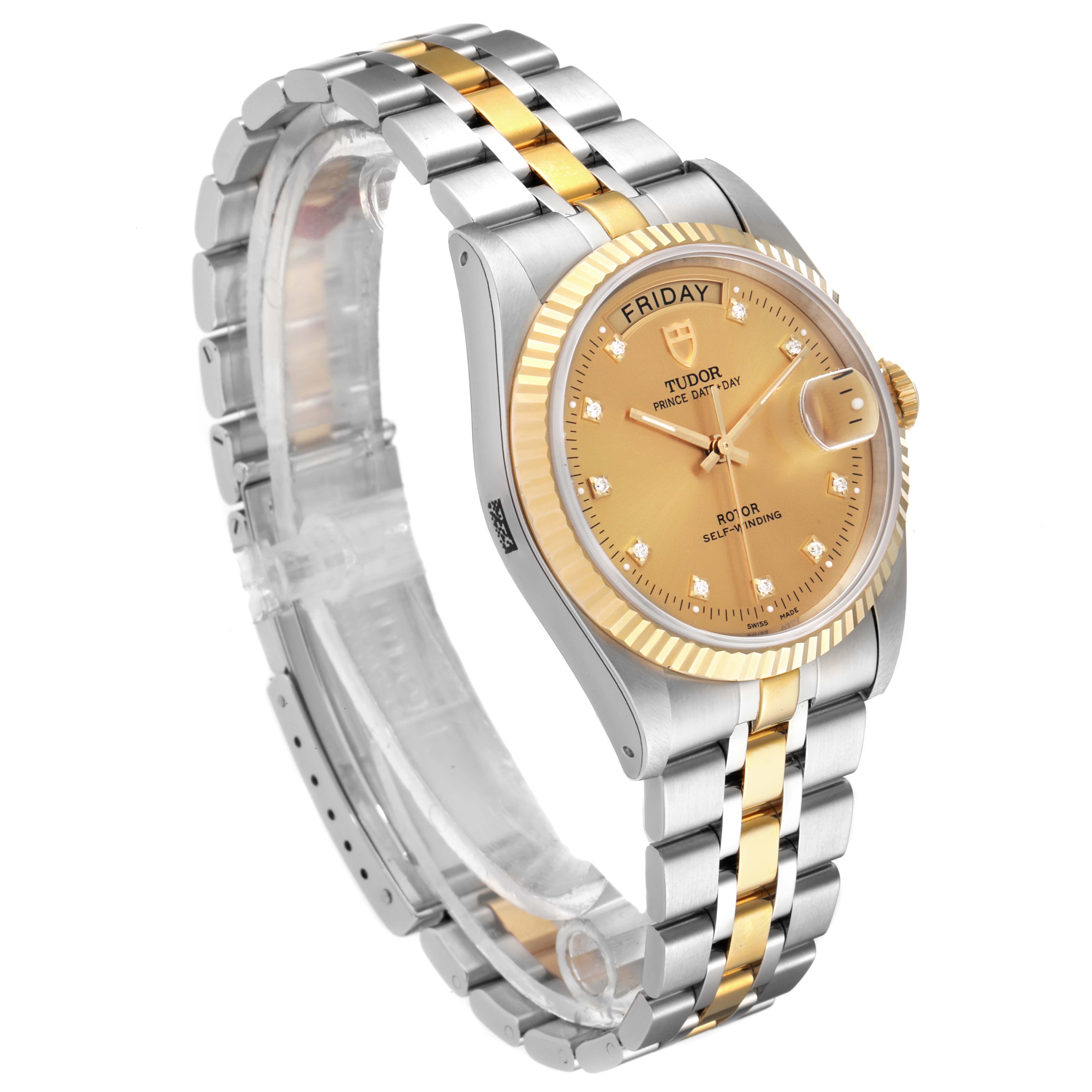 The image shows a Tudor Prince 76213 Men's Steel and Gold (two tone) Champagne Dial 76213 Men's Steel and Gold (two tone) Champagne Dial model watch at an oblique side angle, highlighting its two-tone band, gold bezel, and champagne dial.