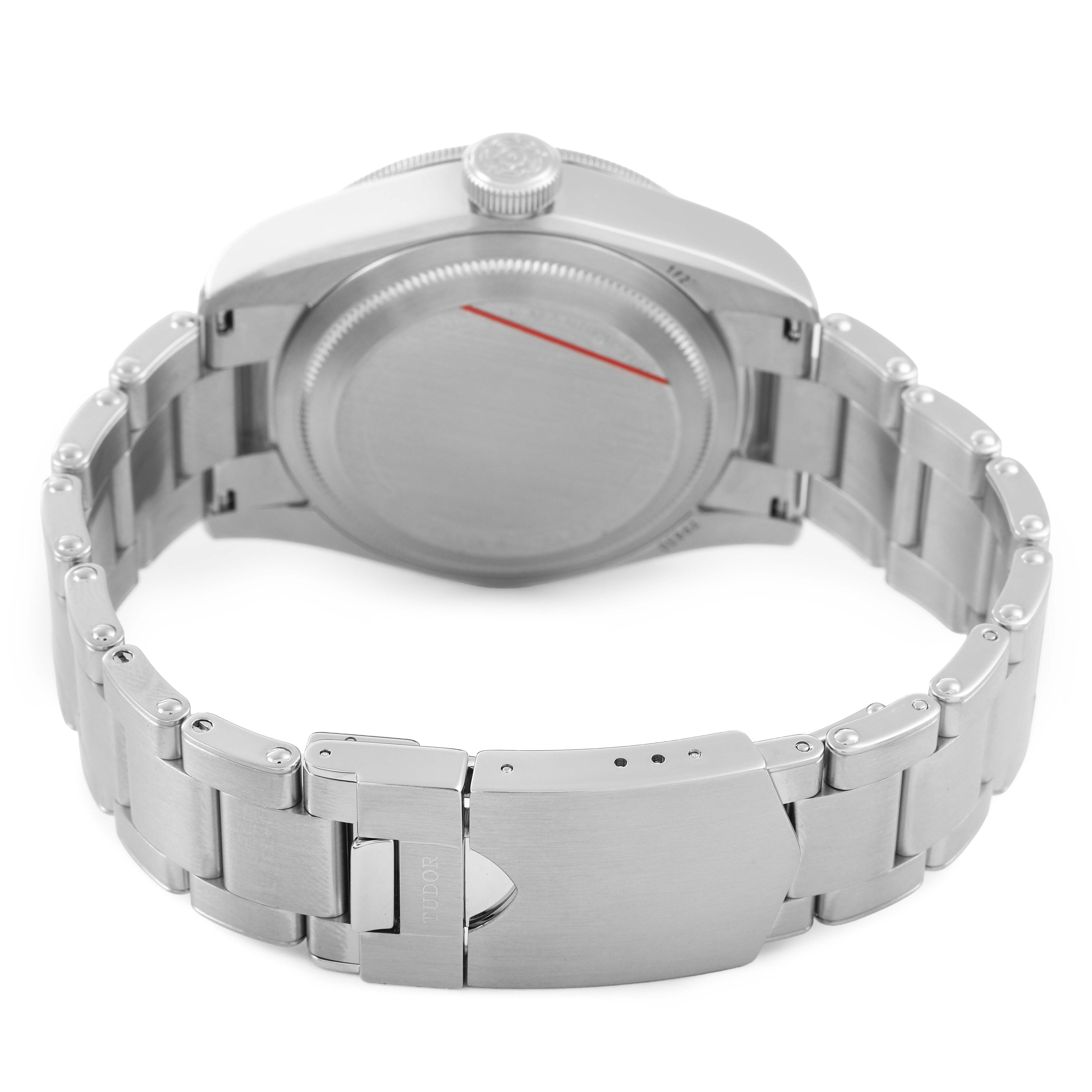 The image shows the back of the Tudor Heritage Black Bay 79830RB Men's Stainless Steel Silver Dial watch, emphasizing the clasp and stainless steel bracelet.