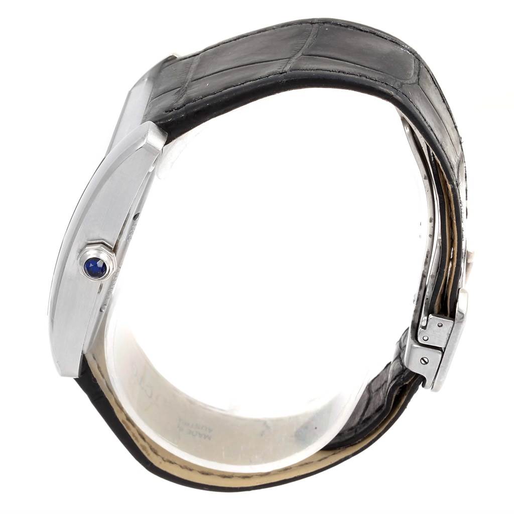 The image shows a side view of the Cartier W5330003 Men
s Stainless Steel Silver Dial W5330003 Men
s Stainless Steel Silver Dial Tank MC Silver Dial Automatic Men
s Watch W5330003, highlighting the crown and strap.