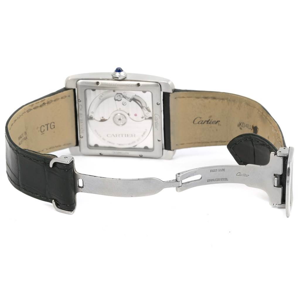 The Cartier W5330003 Men
s Stainless Steel Silver Dial W5330003 Men
s Stainless Steel Silver Dial Tank MC Silver Dial Automatic Mens Watch W5330003 is shown from the back, highlighting the movement and open clasp.