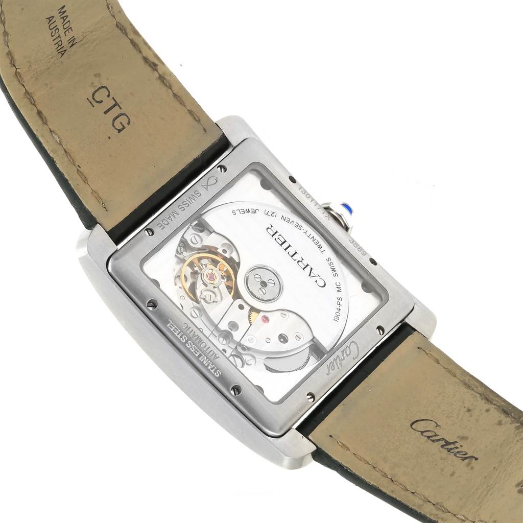This image shows the back view of the Cartier W5330003 Men
s Stainless Steel Silver Dial W5330003 Men
s Stainless Steel Silver Dial Tank MC Silver Dial Automatic Men
s Watch W5330003, displaying its inner mechanism and a leather strap.