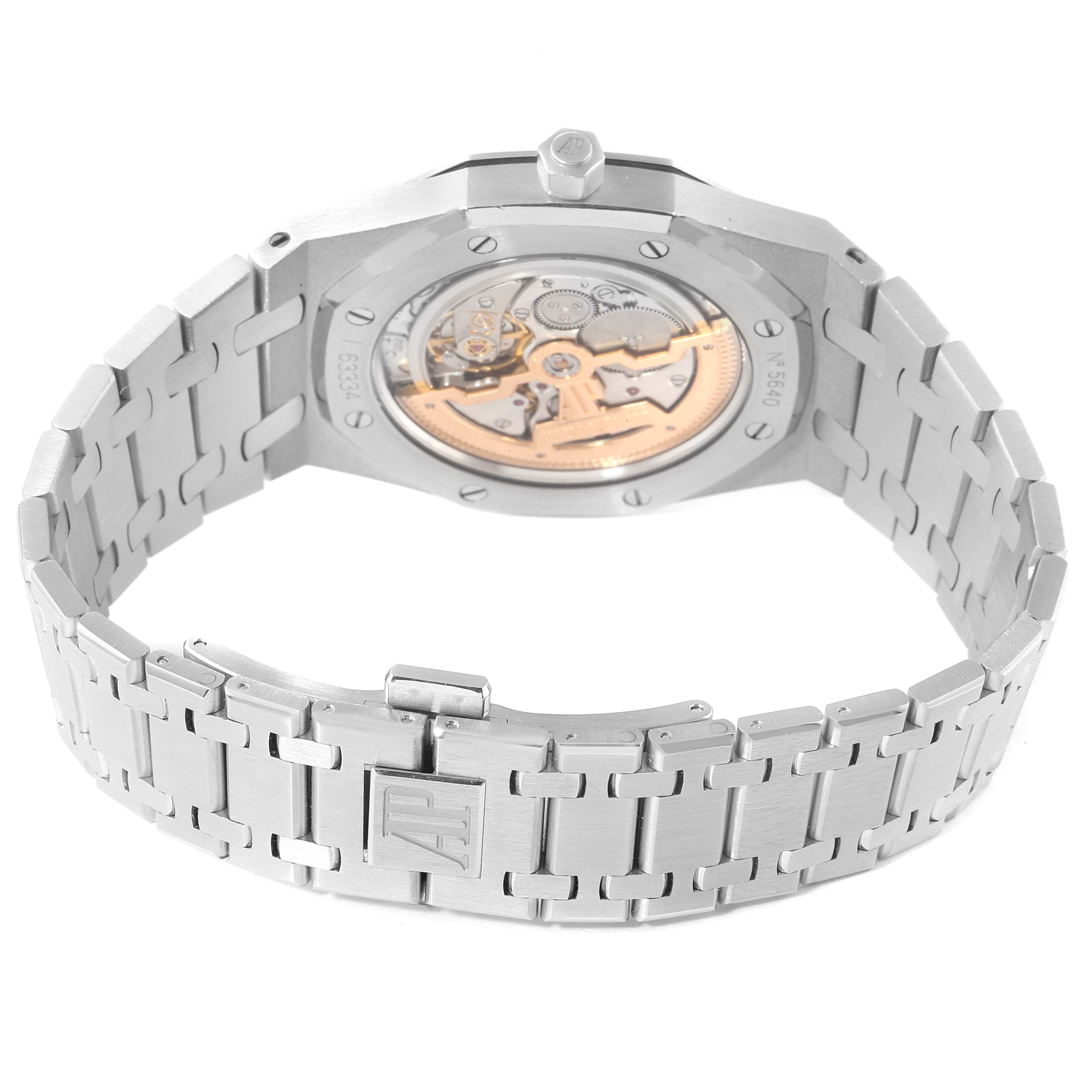 The image shows the back view of an Audemars Piguet Royal Oak 15202ST.OO.1240ST.01 Men's Stainless Steel Blue Dial 15202ST.OO.1240ST.01 Men's Stainless Steel Blue Dial watch, highlighting its open case back, bracelet, and clasp.