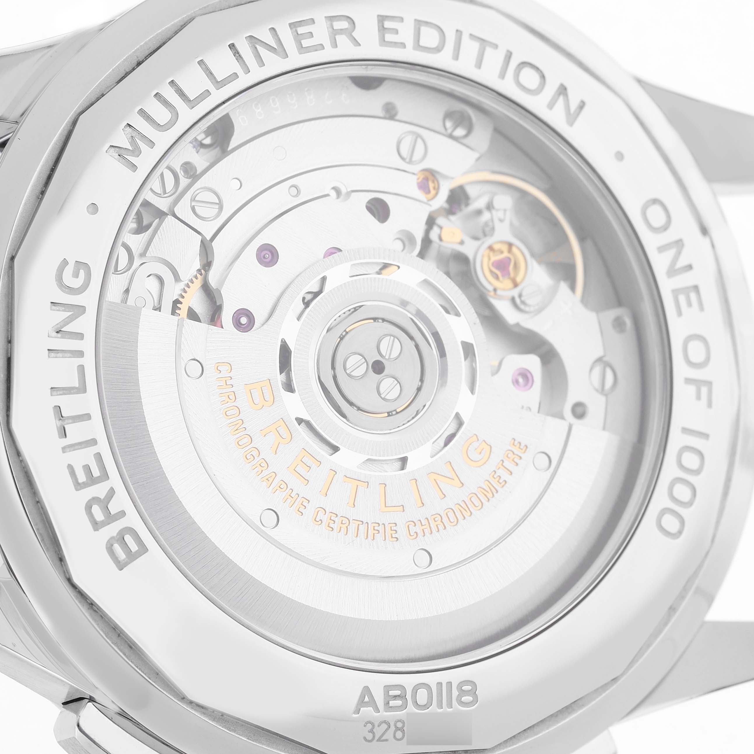 The image shows the back of a Breitling Premier AB0118 Men's Stainless Steel Silver Dial Mulliner Edition watch, displaying its internal mechanism and engravings.