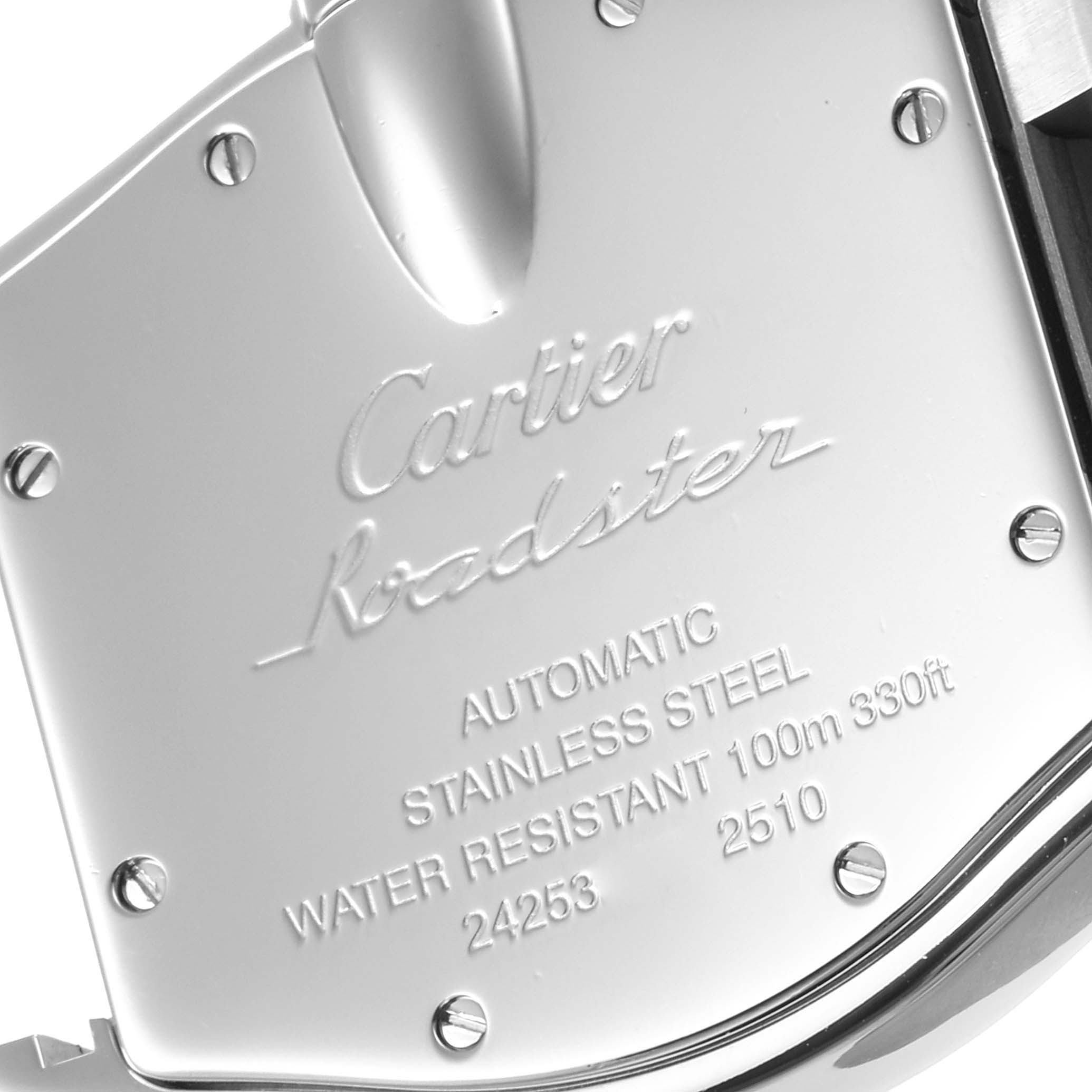 This is a close-up image of the back case of a Cartier Roadster W62041V3 Men's Stainless Steel Black Dial W62041V3 Men's Stainless Steel Black Dial watch, showing engraved details.
