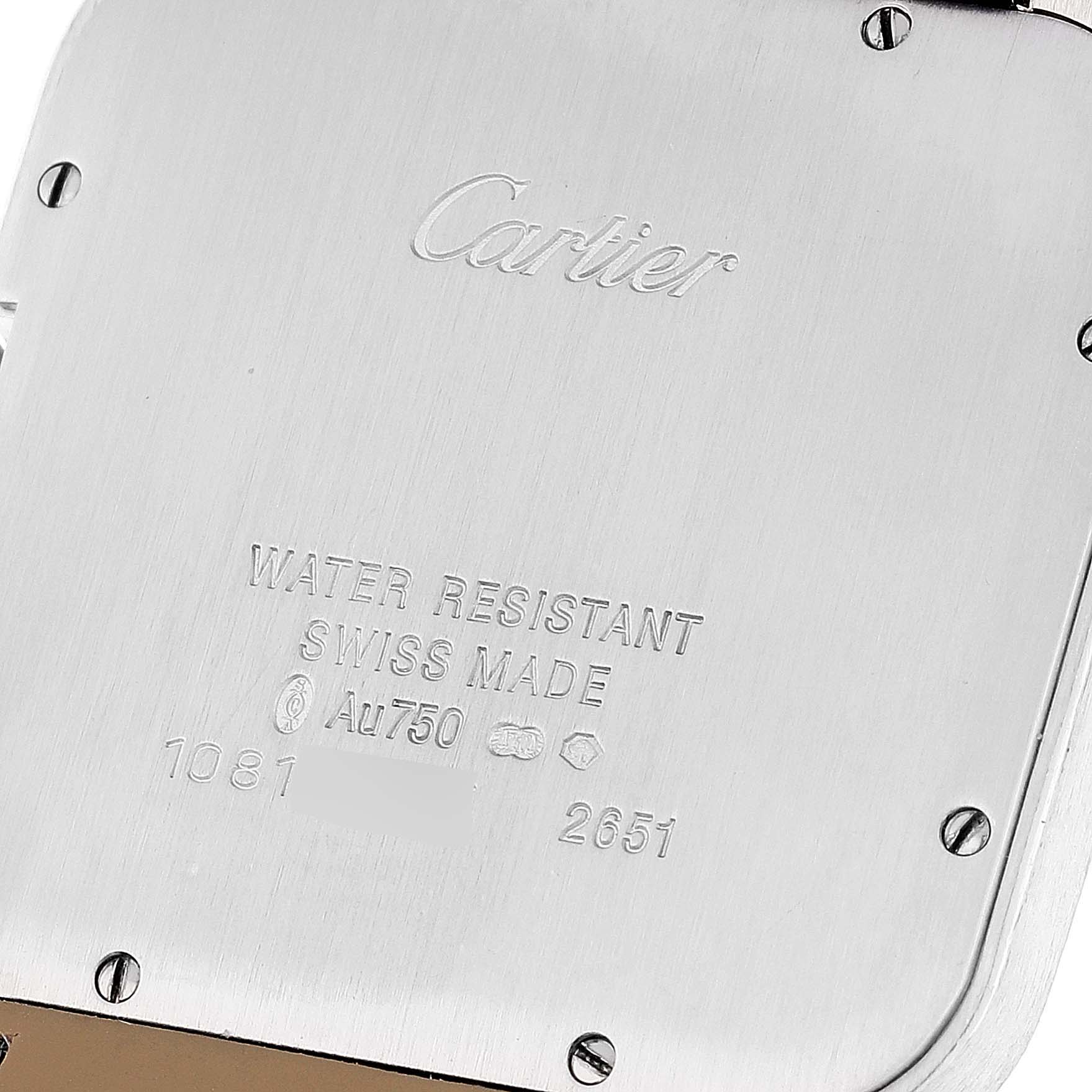 The image shows the back of a Santos Dumont model by Cartier, highlighting its engravings and screws.