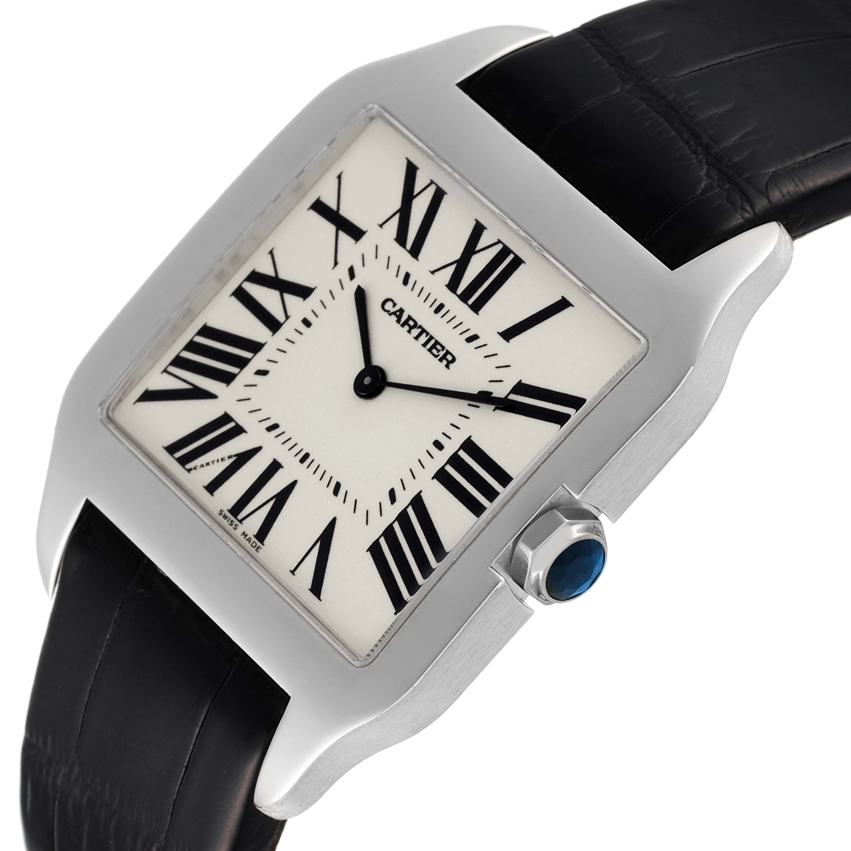 The image shows a top-side view of a Santos Dumont watch by Cartier, highlighting the face, bezel, and part of the strap.
